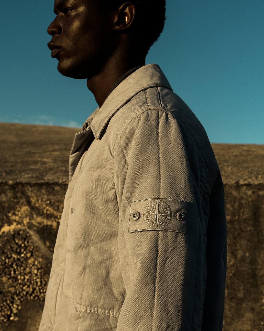 STONE ISLAND UNVEILS GHOST SS26 WITH CALIFORNIAN WORKWEAR