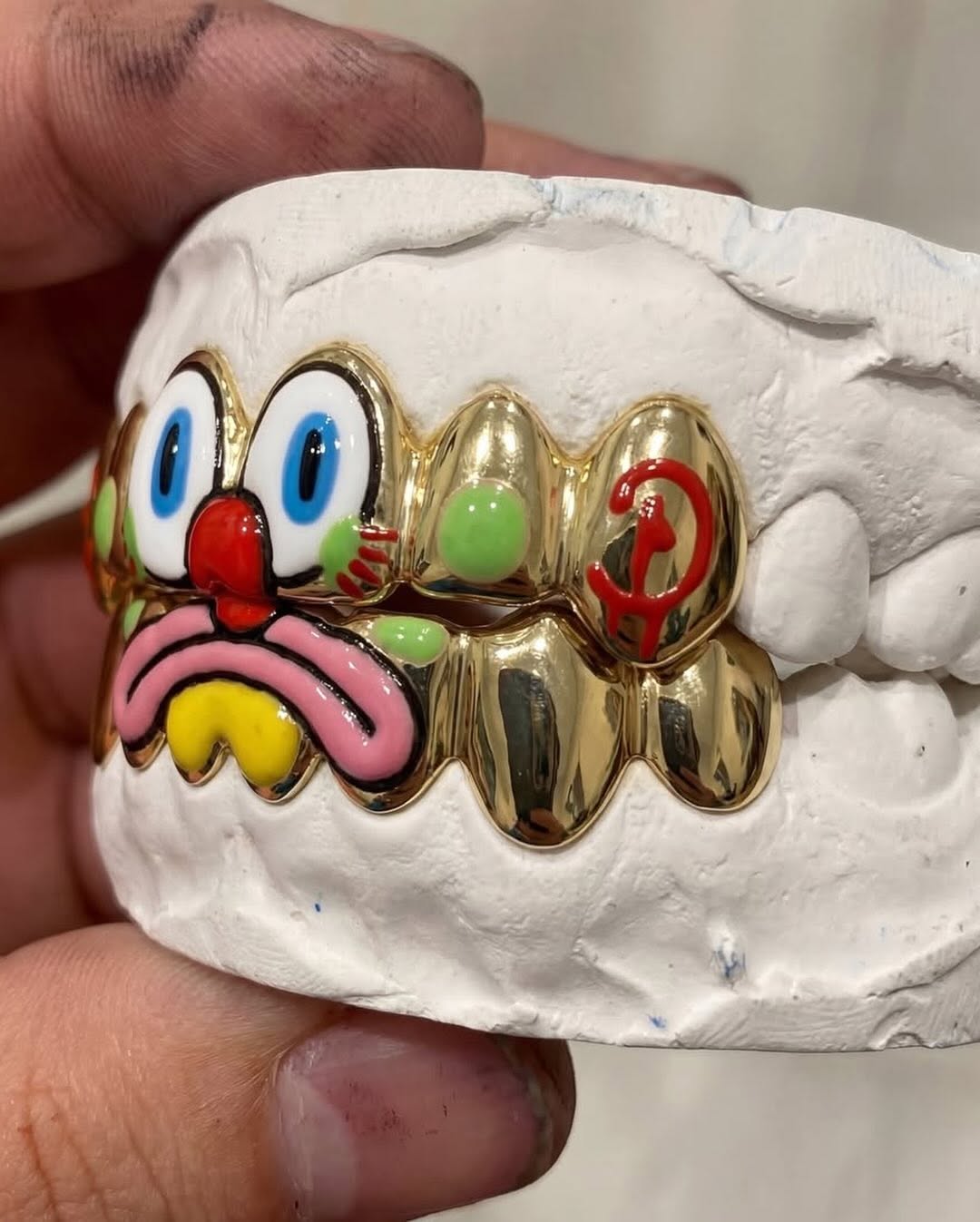OLAOLUSLAWN TRANSFORMS GRILLZ INTO FINE ART WITH KABIL COLLABORATION (image 2)