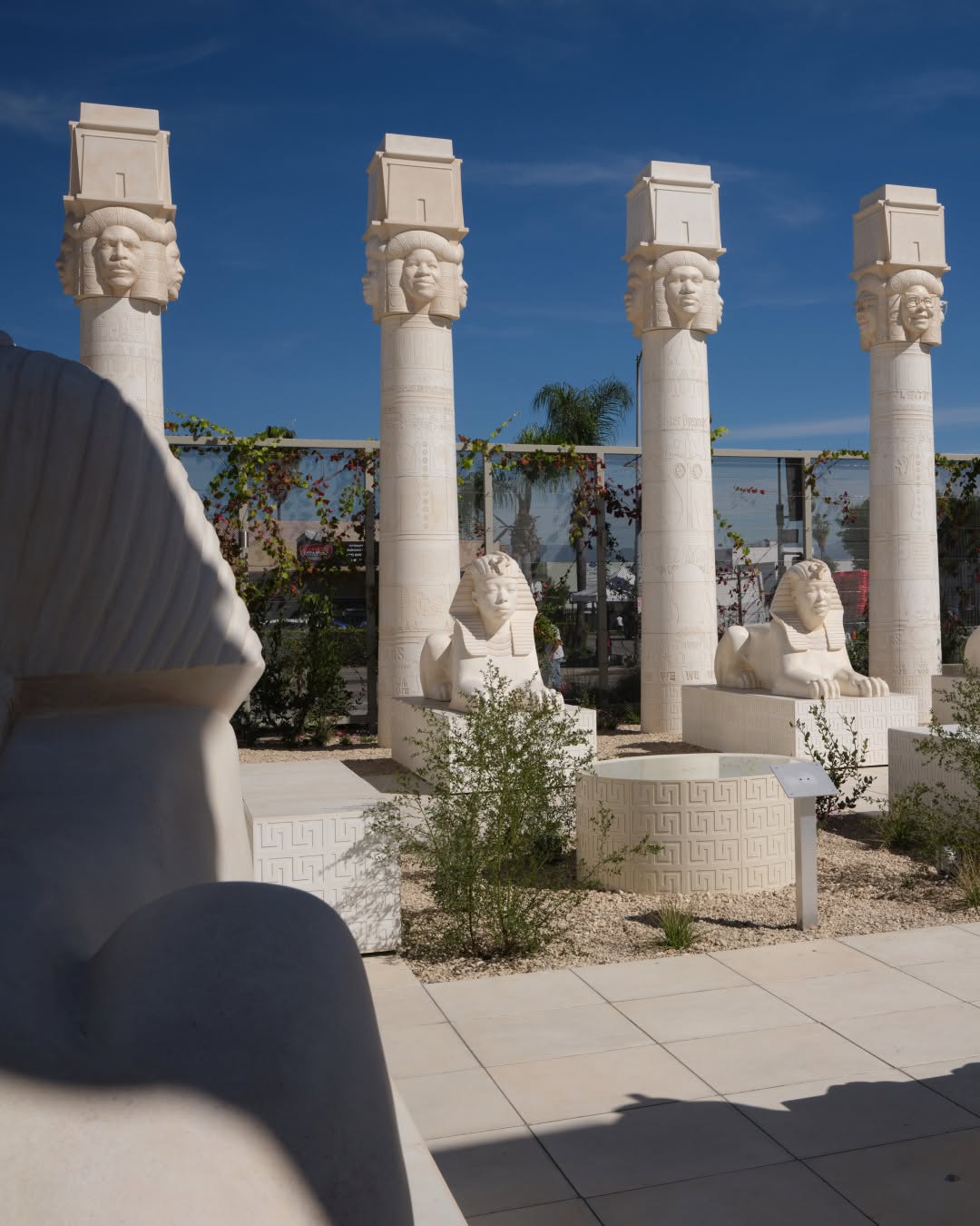 LAUREN HALSEY BUILT A SCULPTURE PARK IN SOUTH CENTRAL AND THE SPHINXES FACE WEST