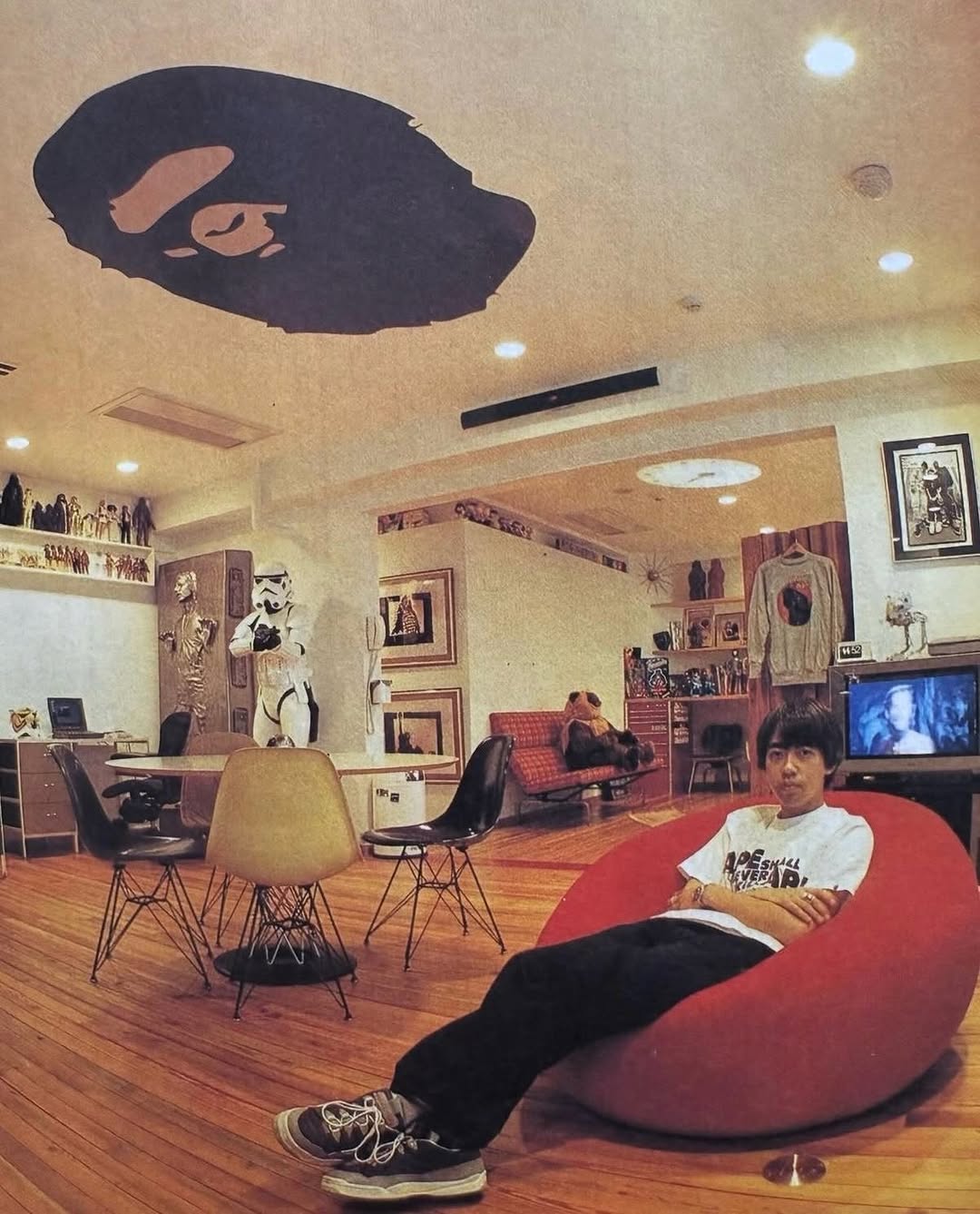 A Bathing Ape BAPE clothing displayed including camo print and Bapesta sneakers from the brand's archive