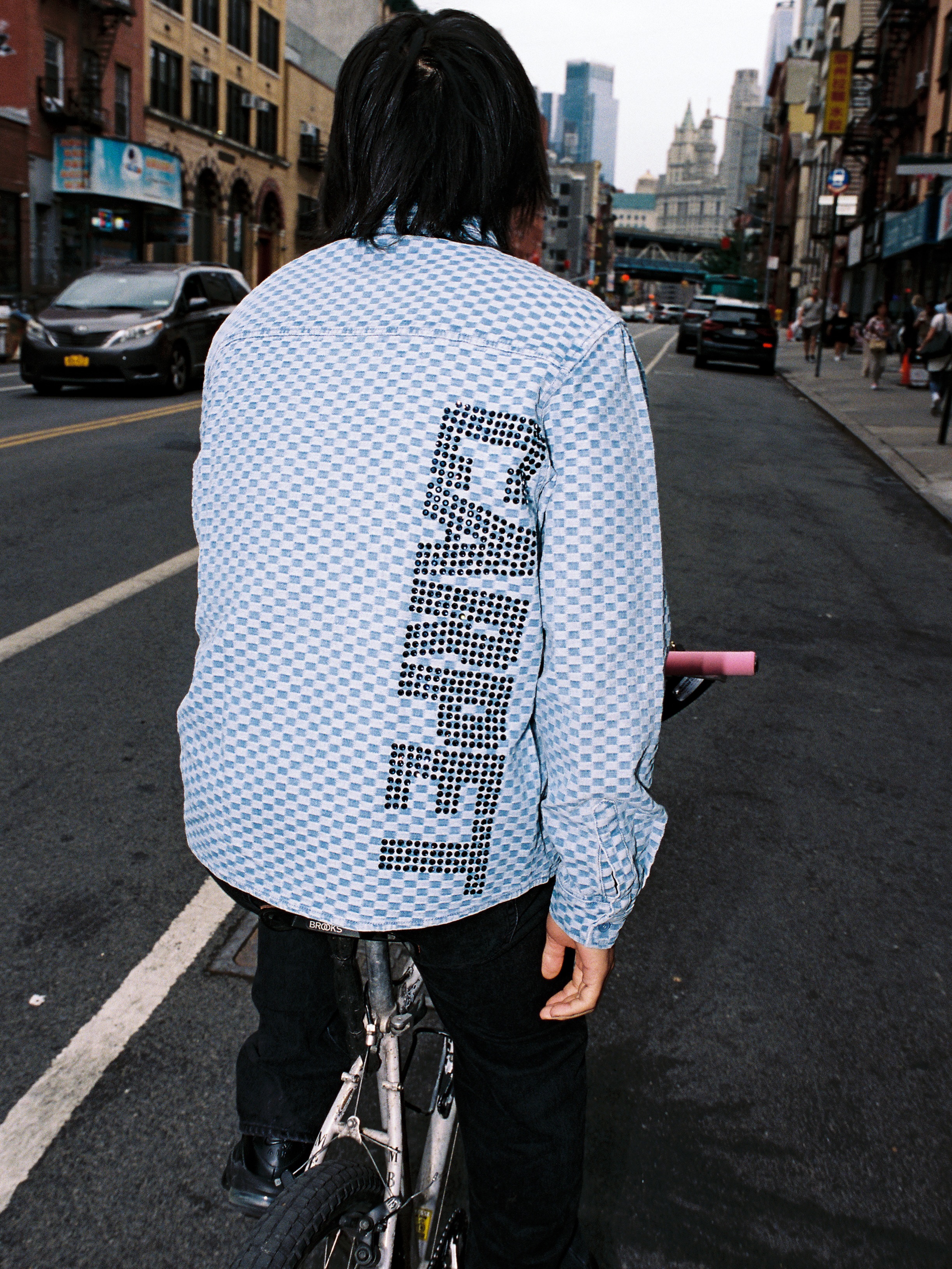 Carpet Company checkerboard denim rhinestone button up apparel from the brand's Instagram announcement