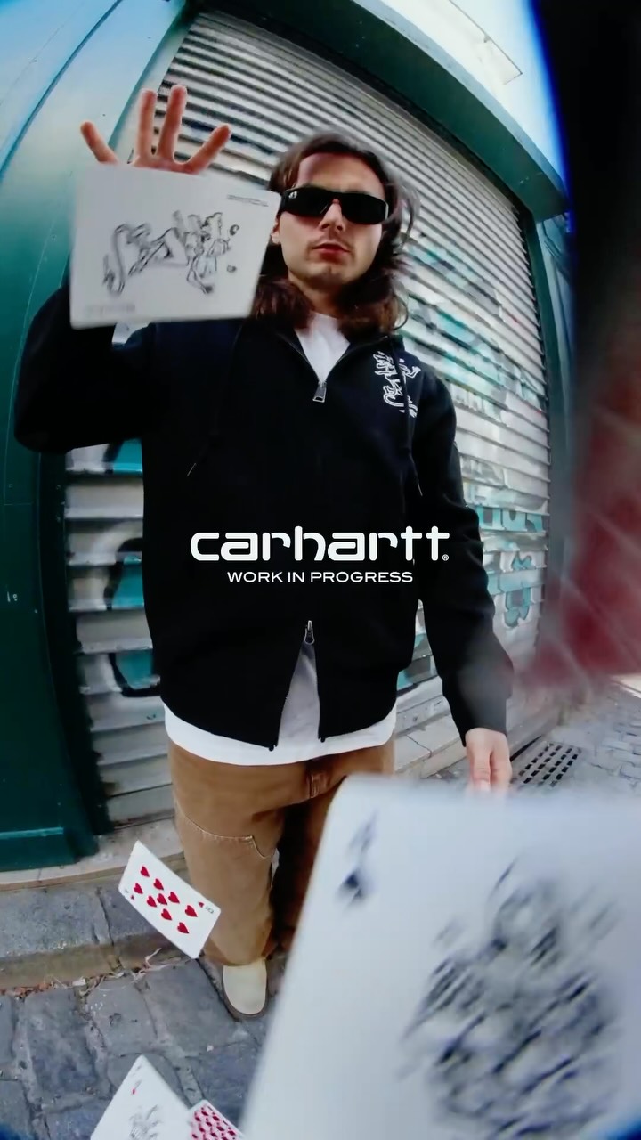A Carhartt WIP Bicycle playing card deck and box in red, black and white