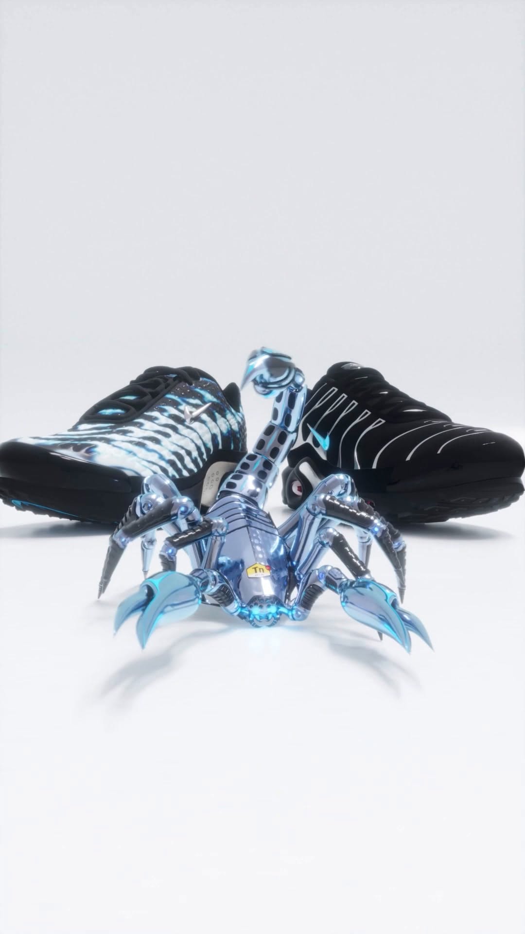 Nike Air Max Plus TN Scorpion Pack sneaker in black, gamma blue and chrome with a scorpion graphic on the tongue