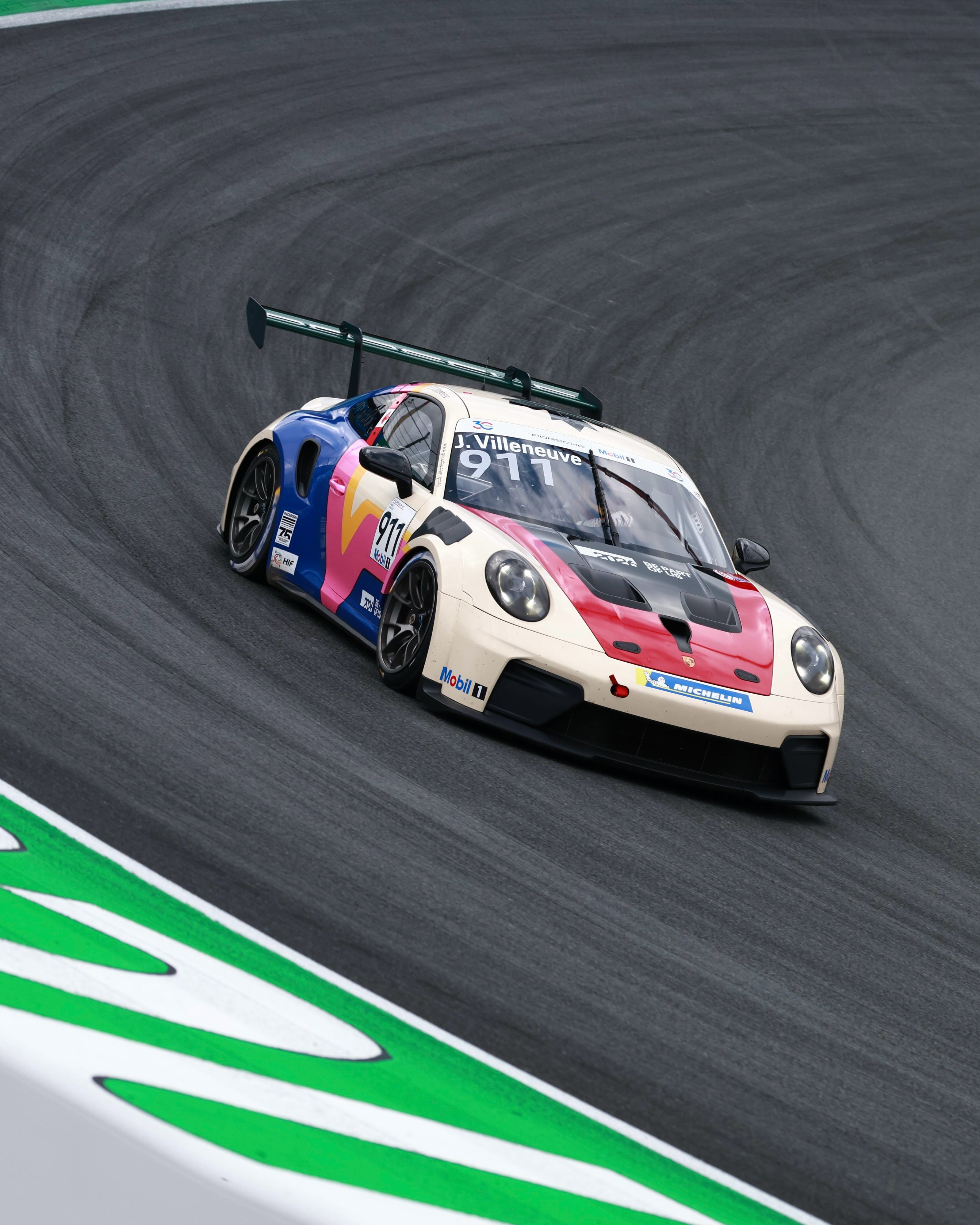 JACQUES VILLENEUVE RACES A PORSCHE NUMBERED 911 AT 55 (image 2)