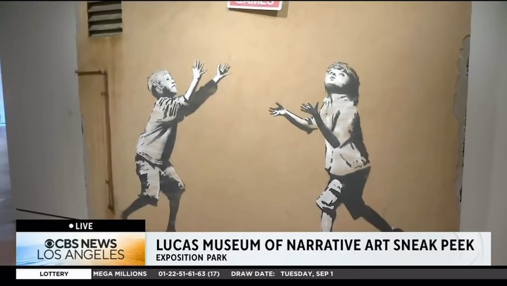 A CBS News LA video still of Lucas Museum of Narrative Art CEO Tracey Bates discussing the new Banksy piece ahead of the museum's September 2026 opening.