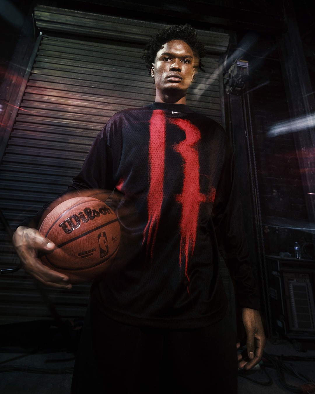 Oversized Nike NBA Standard Issue Collection apparel featuring blown up team graphics