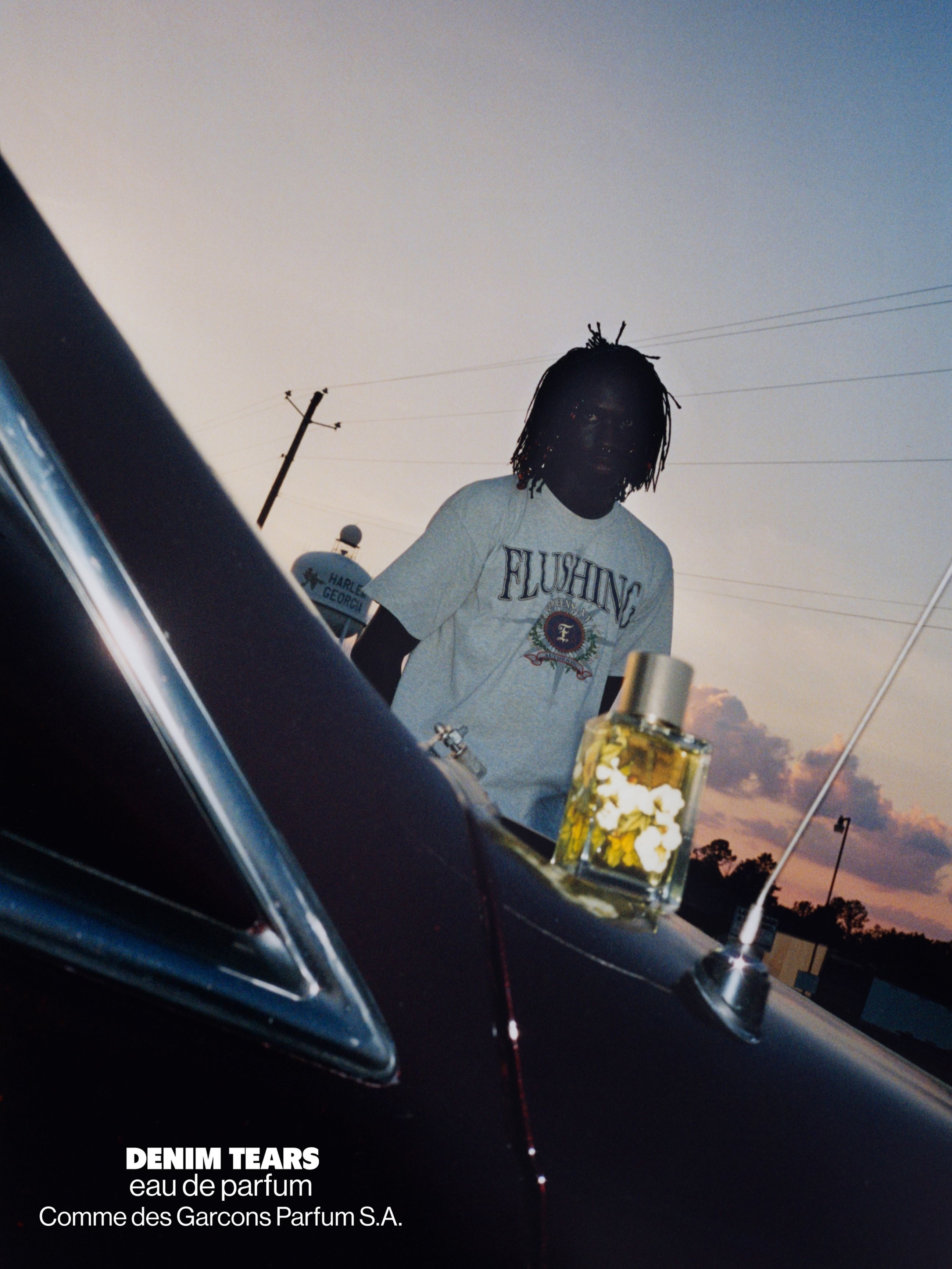A promotional image from Denim Tears and Comme des Garcons Parfums' Tears fragrance campaign, shot in Harlem, Georgia.