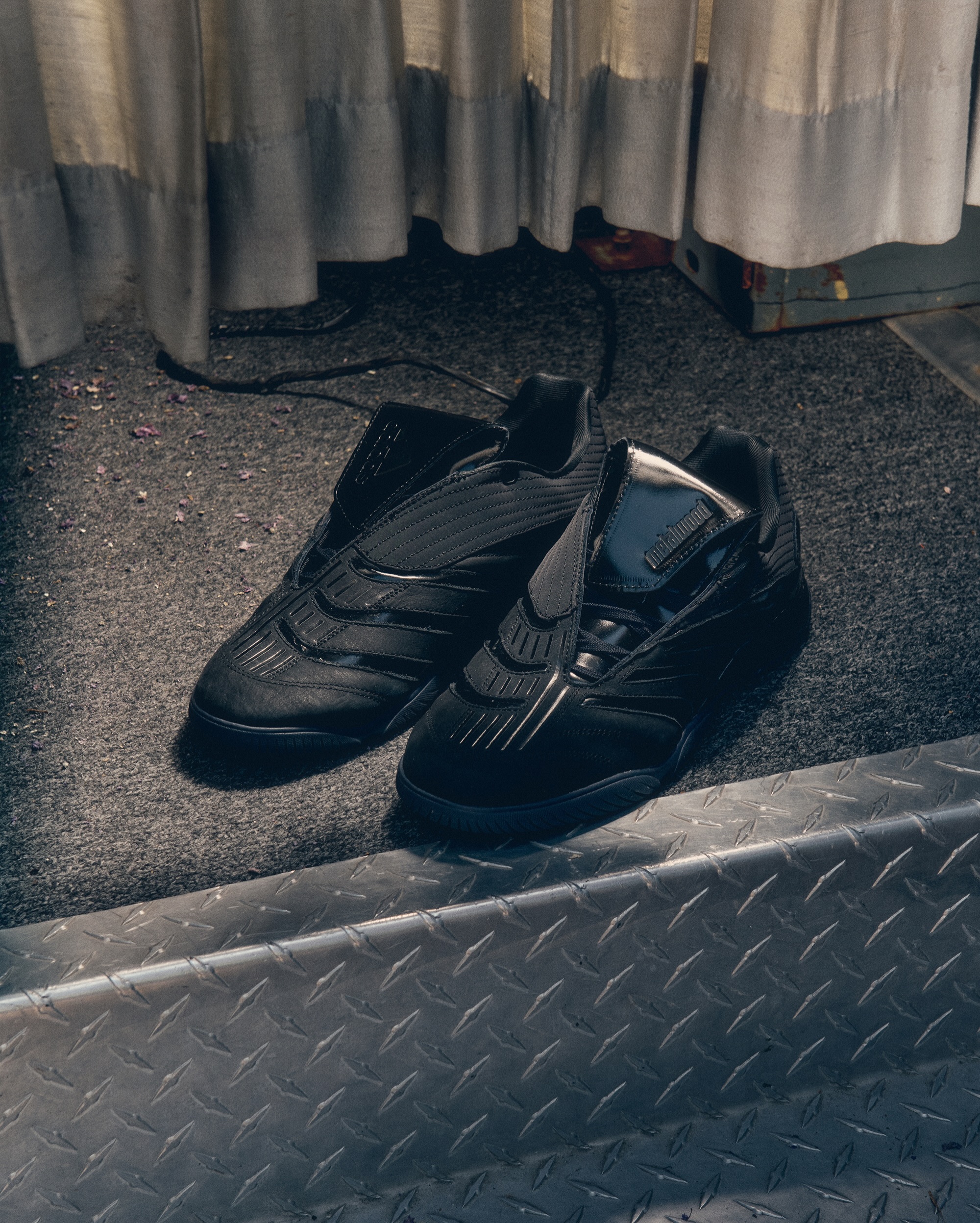The adidas x Metalwood Predator Sala sneaker in the Core Black colorway