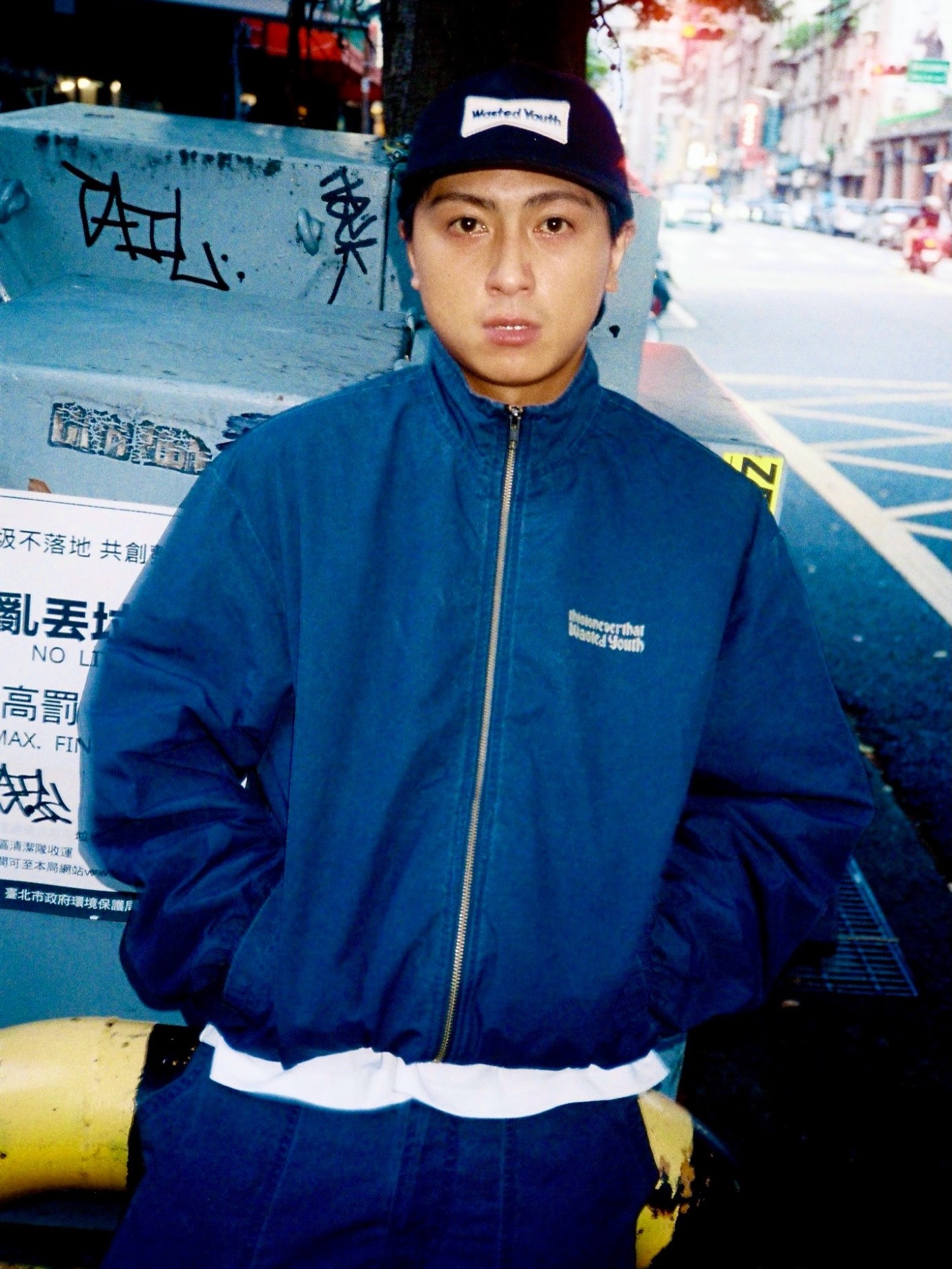 A campaign image for the thisisneverthat x Wasted Youth FW26 collaboration collection, credited to Udai, @udai65.