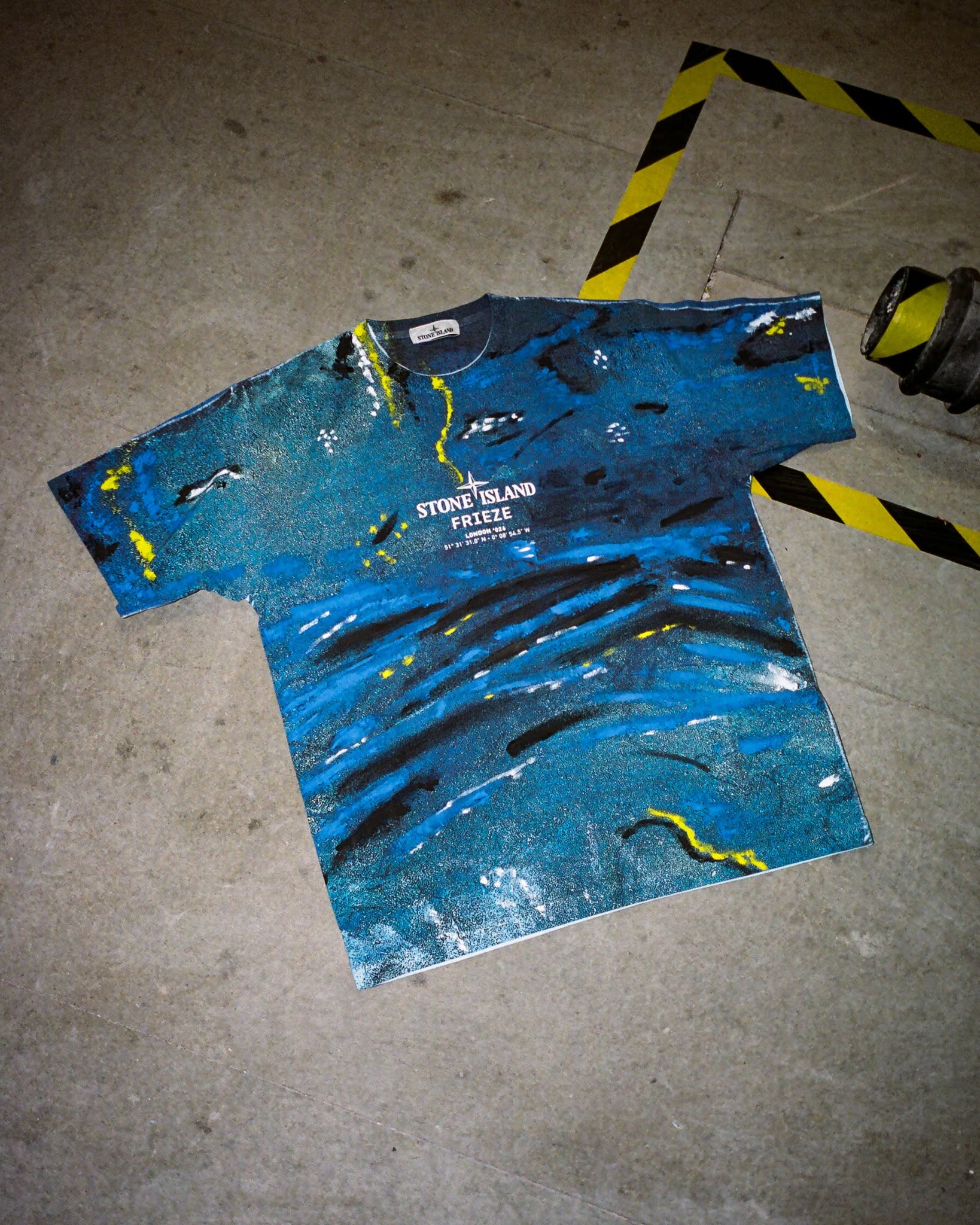The Stone Island Frieze Focus uniform T shirt with an Arébénor Basséne artwork.