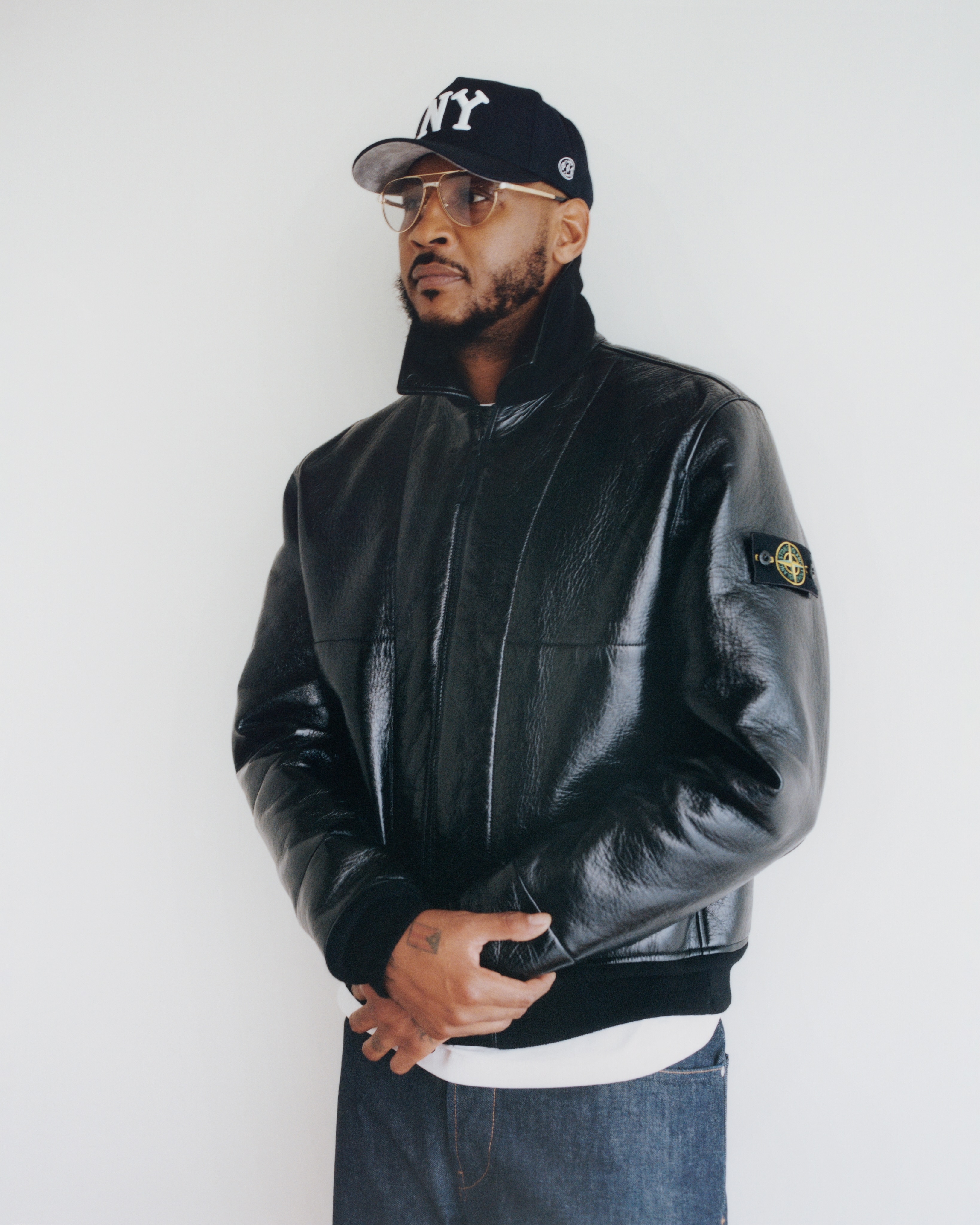 Carmelo Anthony in a Stone Island bonded rubberized leather jacket, shot by Liam Macrae