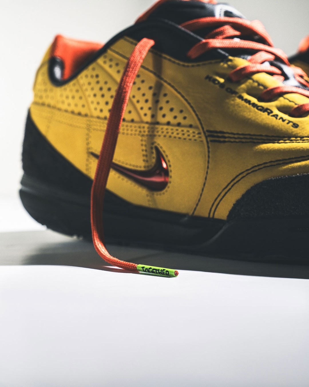 Kids of Immigrants Splits Yellow Across Two Nike Tiempos (image 2)
