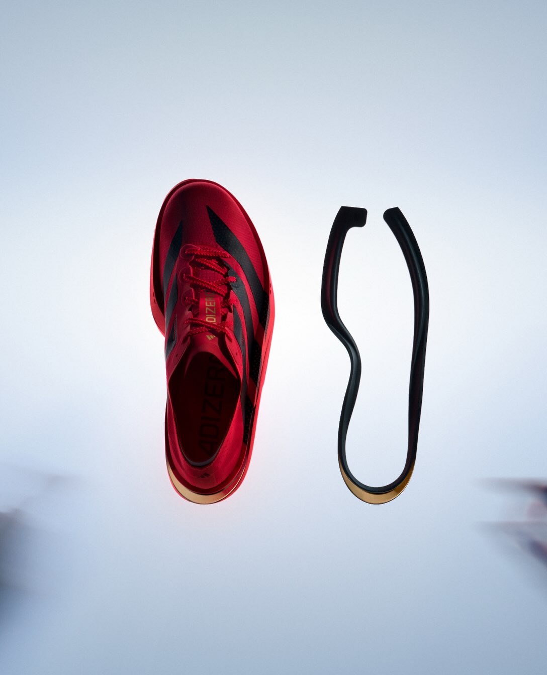 The Adidas Adizero Adios Pro 5 marathon racing shoe in Turbo, Black and Red.