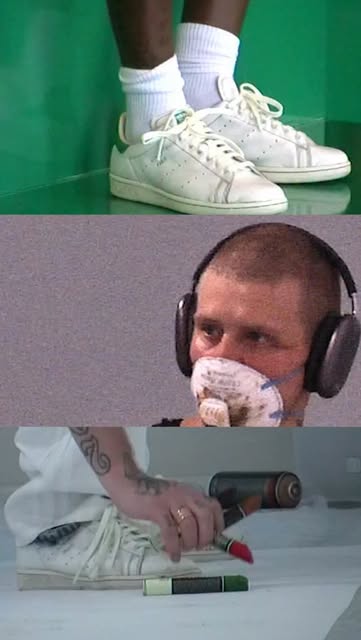 White leather Adidas Stan Smith sneaker with green heel tab and perforated side panels shown in product video, June 2026