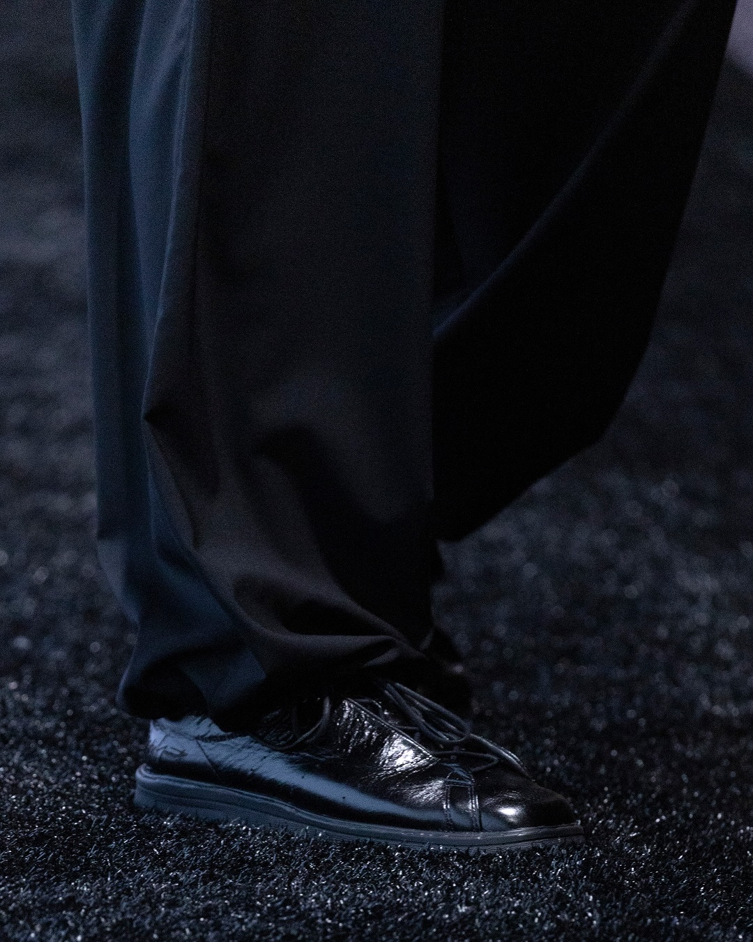 A still from Y-3's Spring Summer 2027 campaign video featuring the reworked Stan Smith sneaker silhouettes.