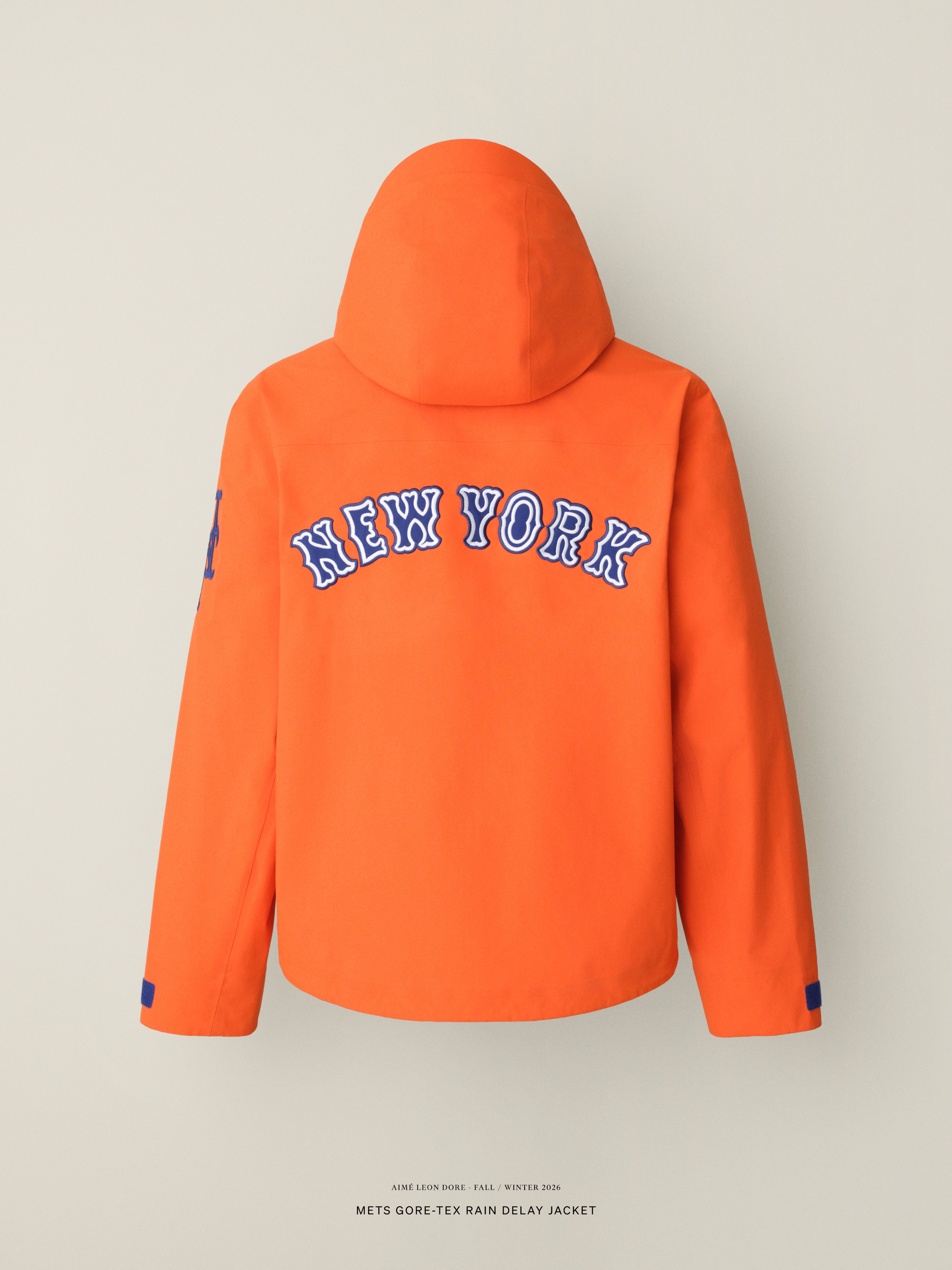 Aimé Leon Dore's GORE-TEX Rain Delay Jacket carrying Mets, Yankees and Dodgers team branding