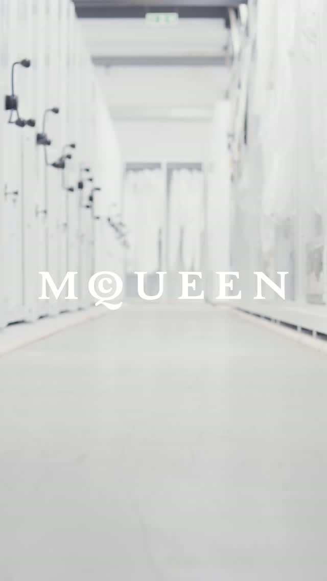 A still from Alexander McQueen's Documenting McQueen video series showing archival footage related to the house's Skull Scarf motif.