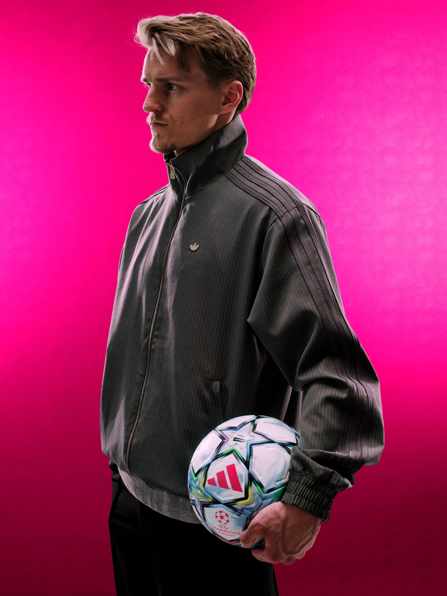 The adidas UEFA Champions League league phase match ball for 2026/27 in white, metallic silver and pink.