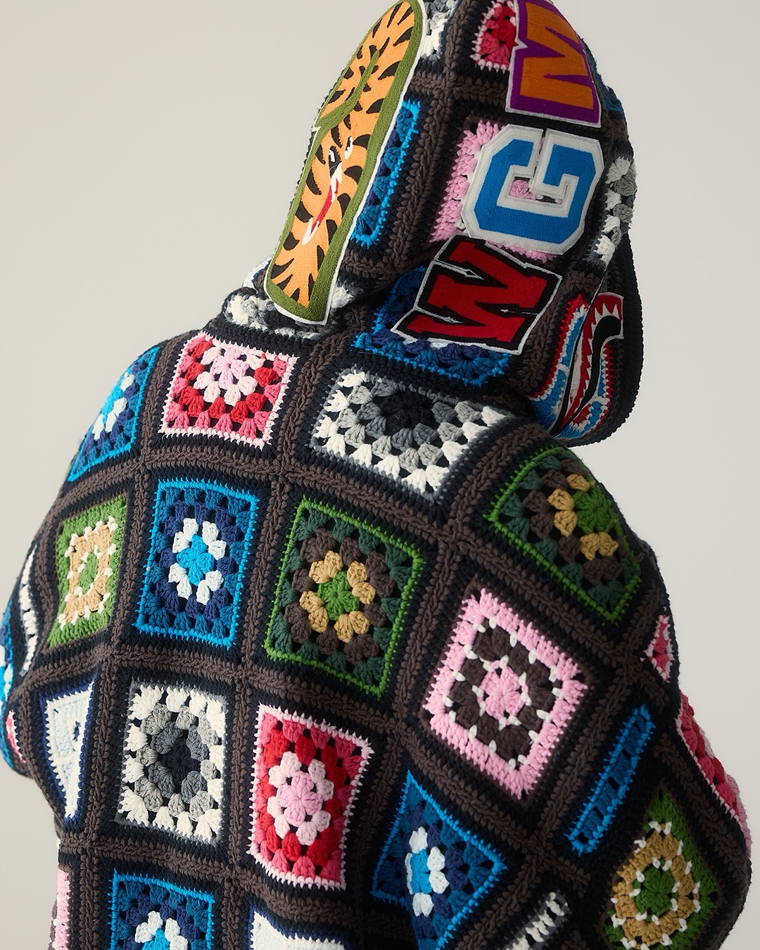 A garment from BAPE's FW26 Art chapter carousel, showing pieces from the reworked souvenir jacket and paisley pattern collection.
