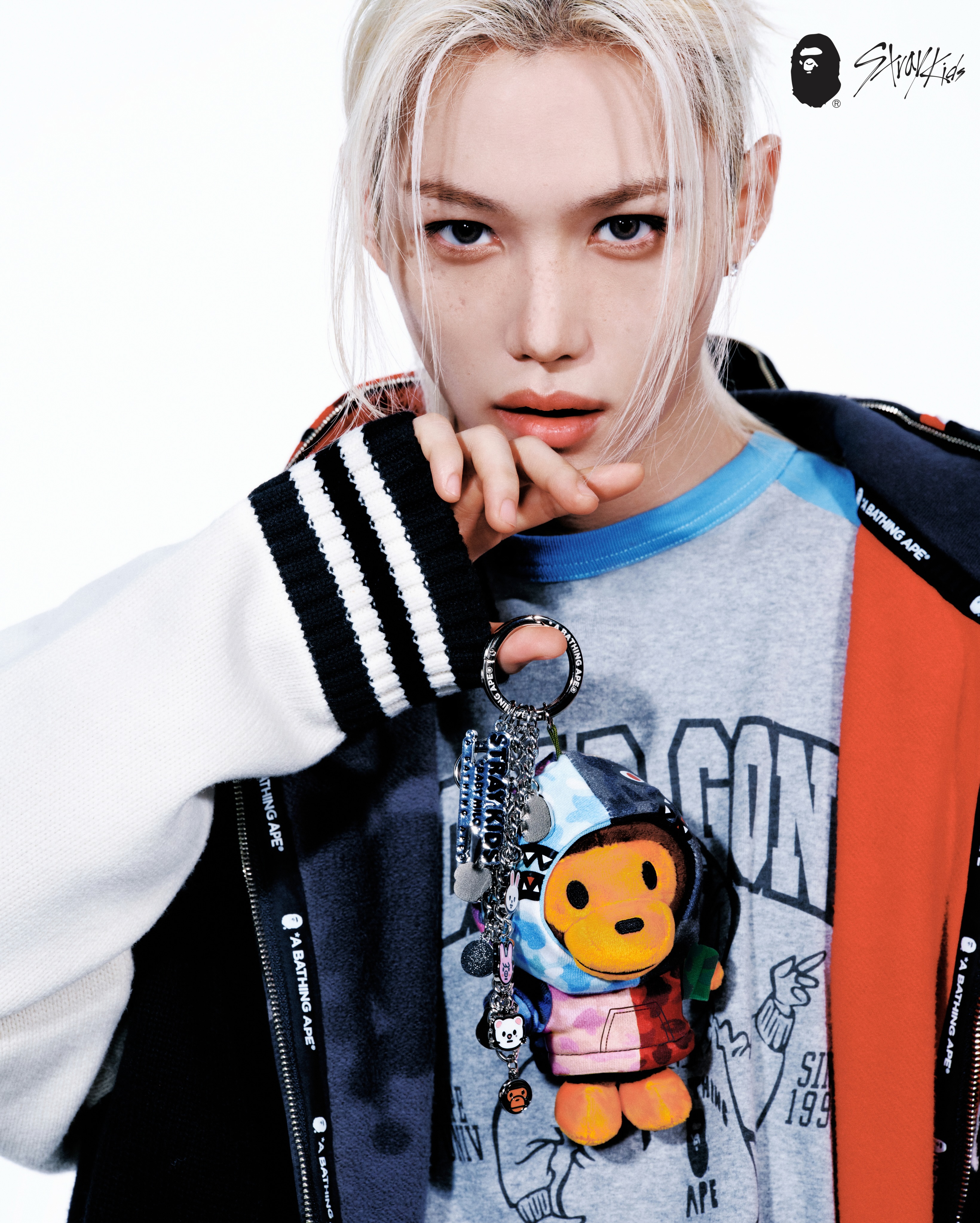 Felix of Stray Kids in BAPE FW26 varsity layers and bold graphics
