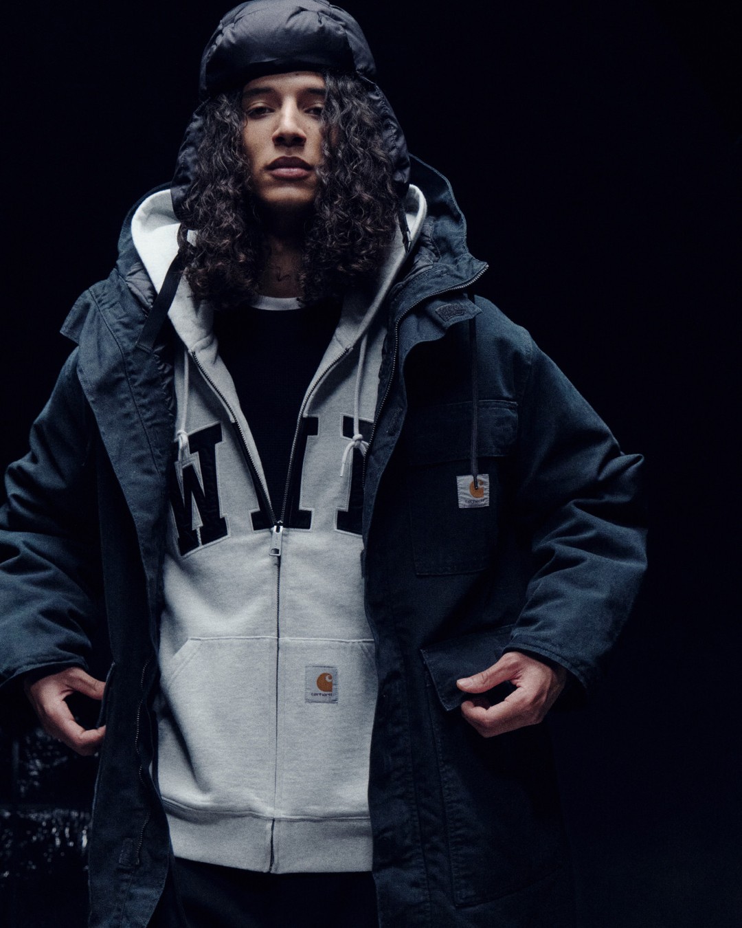 Carhartt WIP sweatshirt and fleece liner with varsity style lettering from the October 2026 campaign