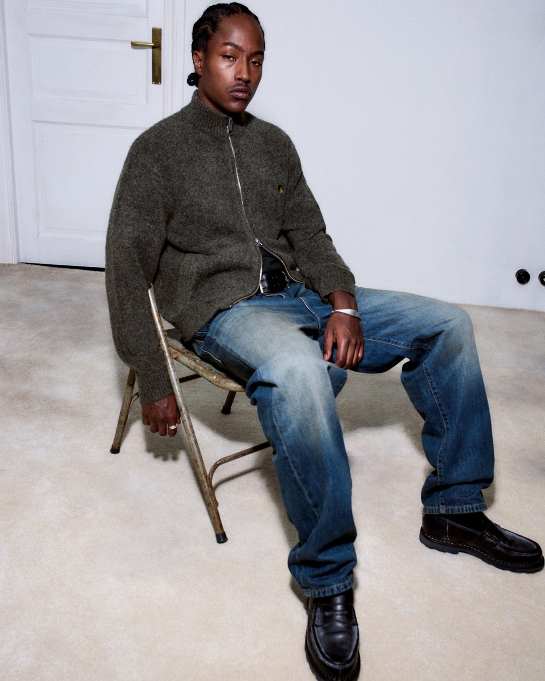 The Carhartt WIP Curtis Sweater Jacket in a brushed, blended yarn knit.