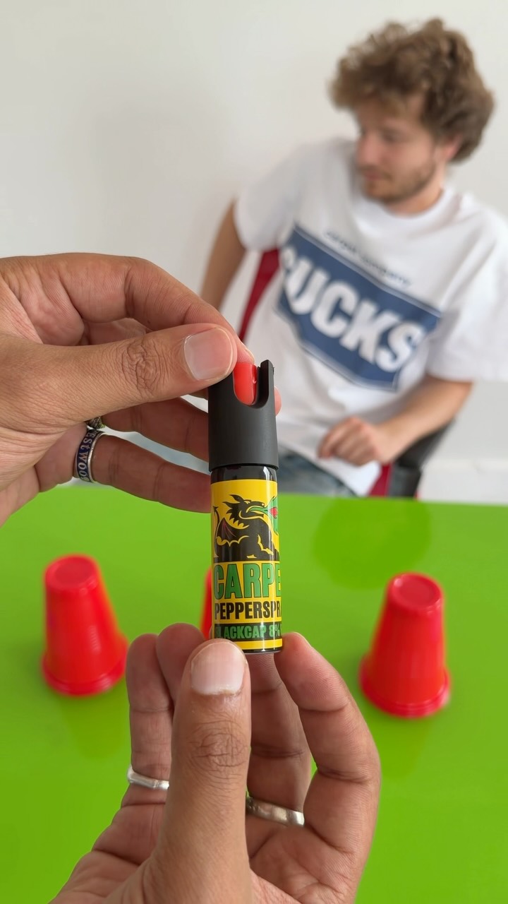 A still frame from Carpet Company's pepper spray teaser video for Season 22 Drop 2