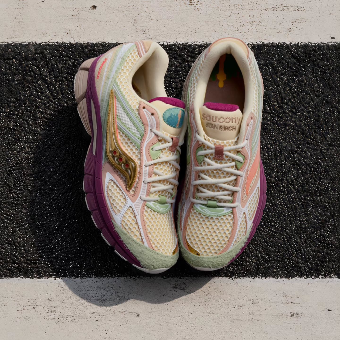 The Stan Birch x Saucony ProGrid Guide 7 Stand Out in its cream, mint, salmon, burgundy and metallic gold colorway