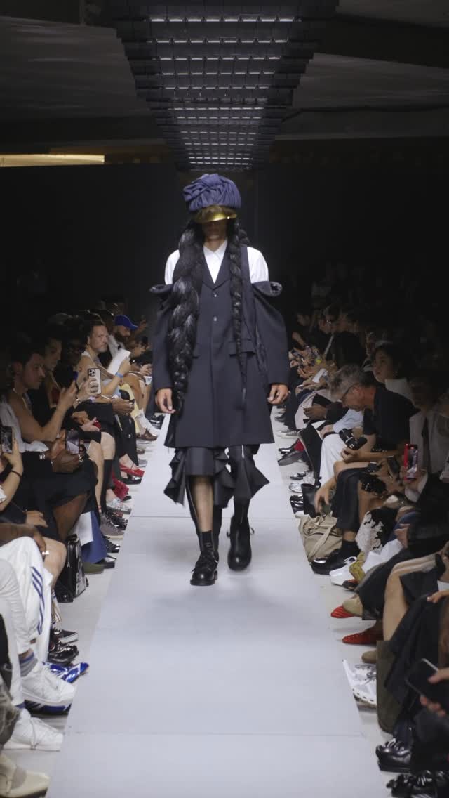 REI KAWAKUBO CALLED FOR A SHAMAN AND SENT DECONSTRUCTED SUITS INSTEAD