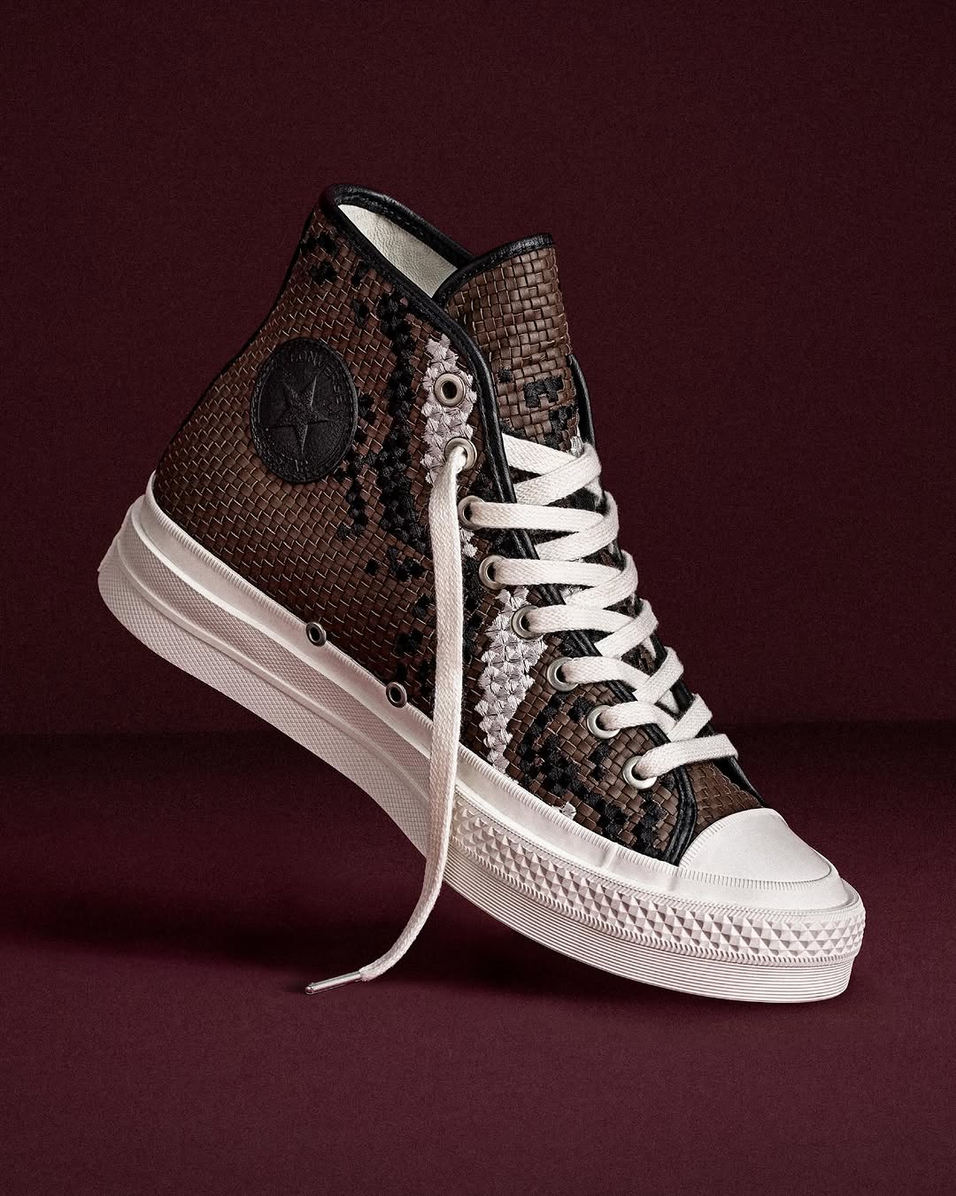 Converse First String Chuck Taylor Woven Leather Drops at $200