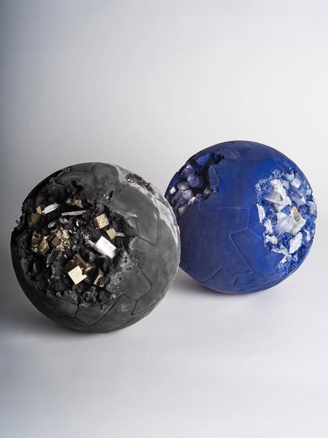 Daniel Arsham studio football sculpture in crystal finish displayed alongside volcanic ash works from the studio archive