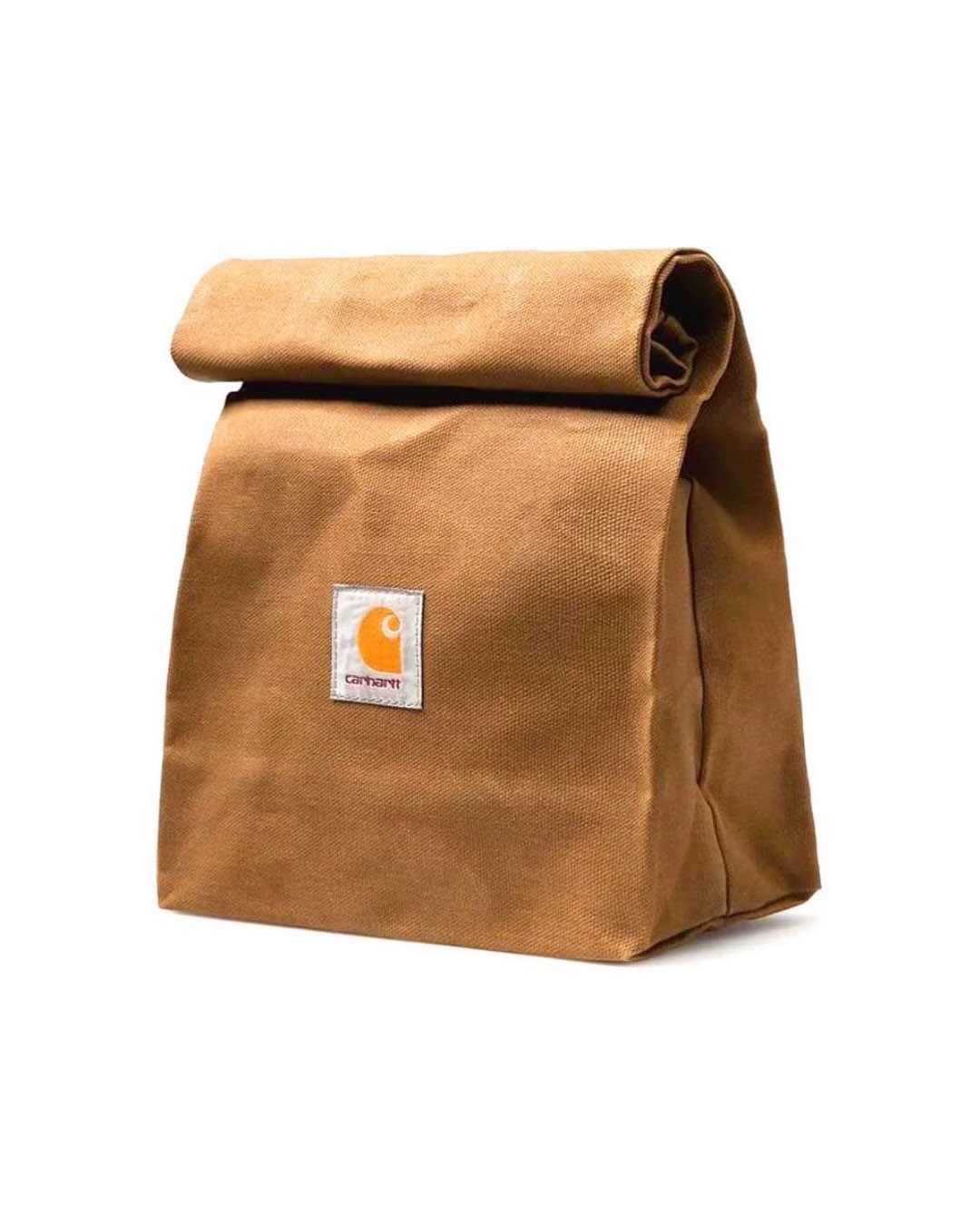 A Carhartt WIP Lunch Bag styled to resemble a folded brown paper sack.