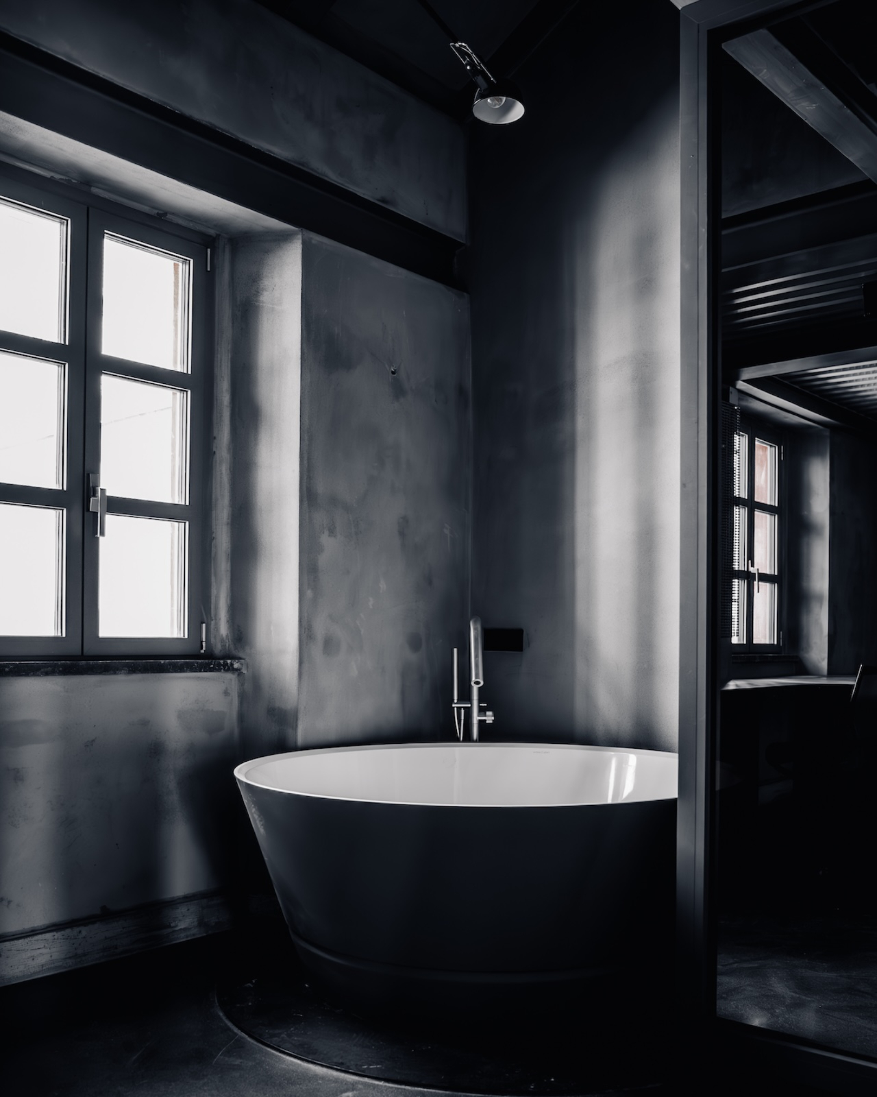 MILAN'S BRUTALIST ART HOME HIDES ONE BLACK STAIRCASE (image 6)