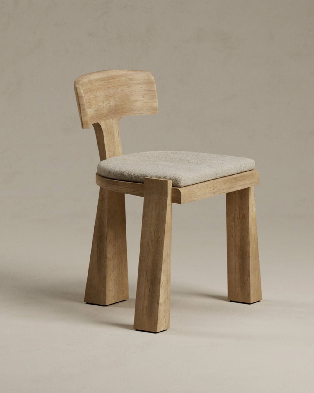 THOMAS MOISAN'S DELHI CHAIR REDEFINES MINIMALIST LUXURY WITH IROKO WOOD