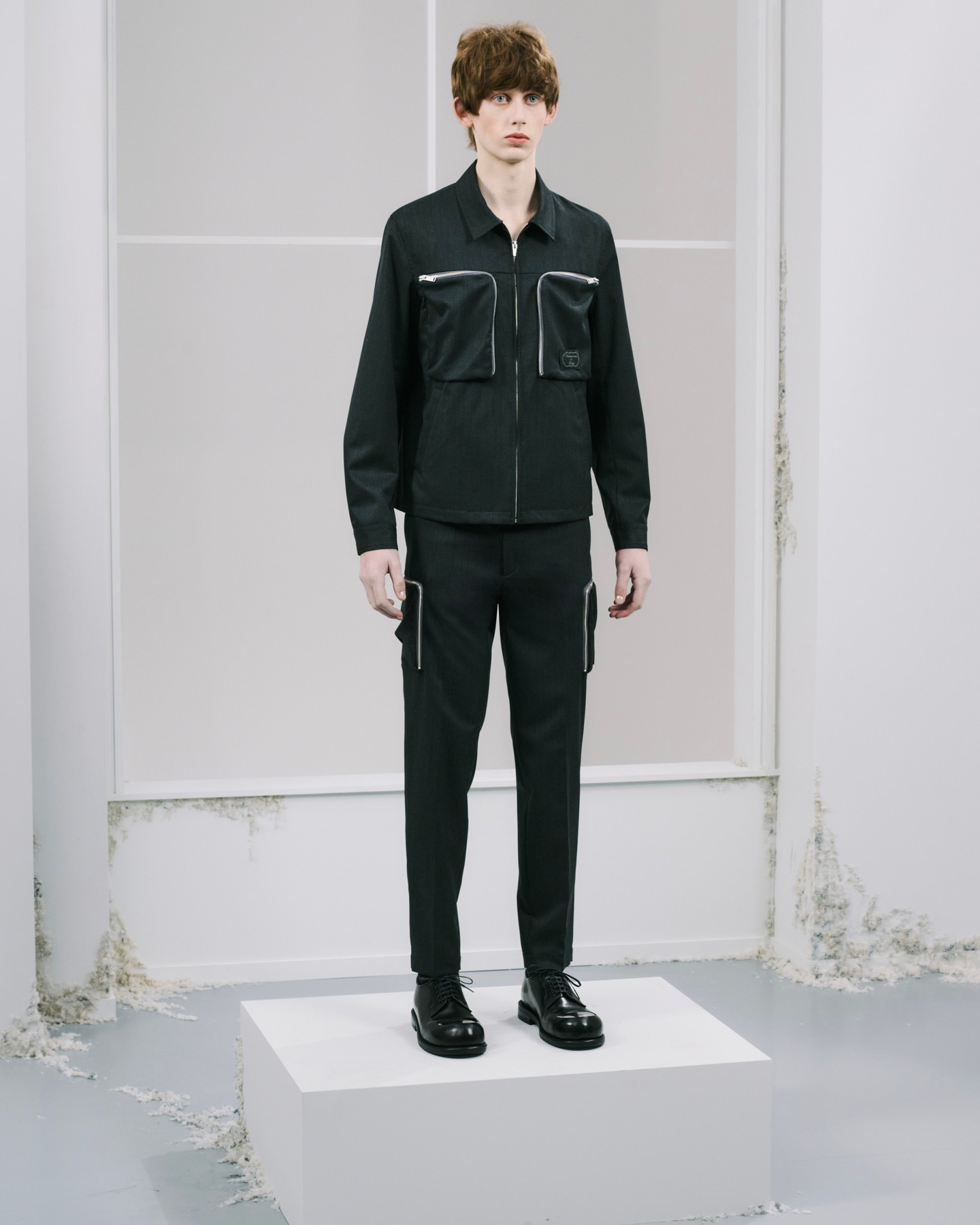 Pieces from Undercover's FW26 pre collection displayed at Dover Street Market New York.