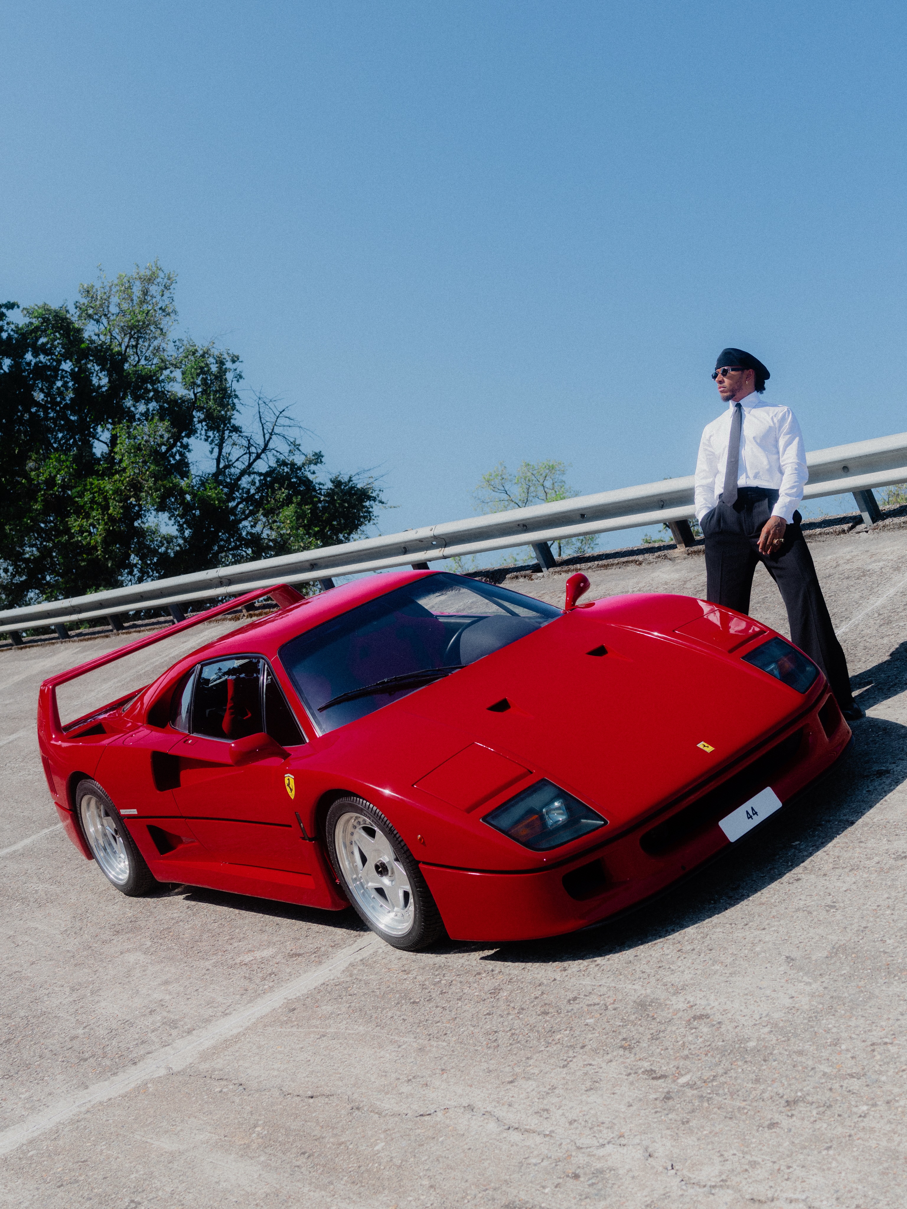 Lewis Hamilton beside a Ferrari F40 on Monza's old high speed banking ahead of the Italian Grand Prix