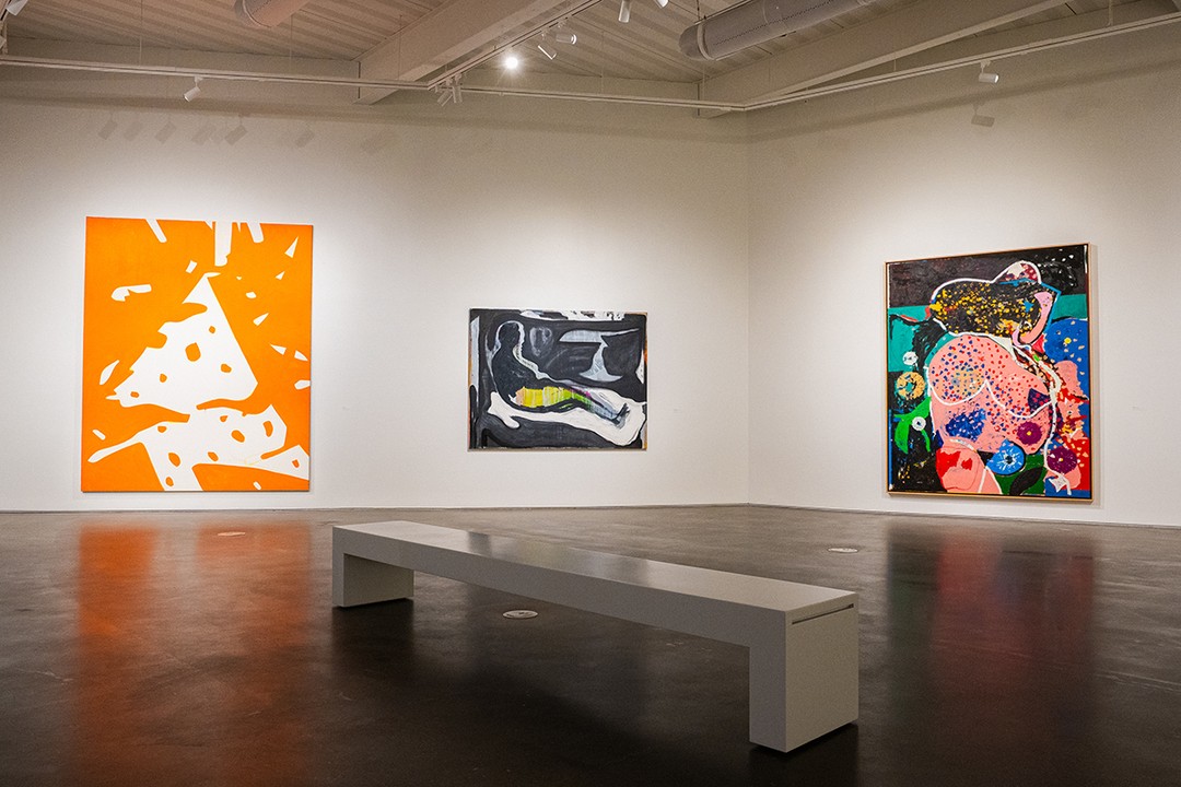 Paintings hang with space between them in Oklahoma Contemporary’s Witty Banter exhibition.