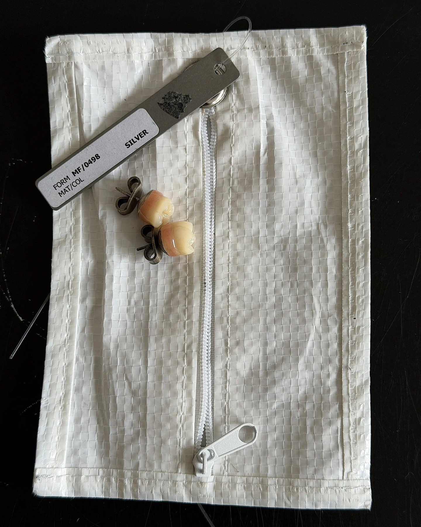 CAROL CHRISTIAN POELL'S TEETH EARRINGS RESURFACE ON GRAILED (image 2)
