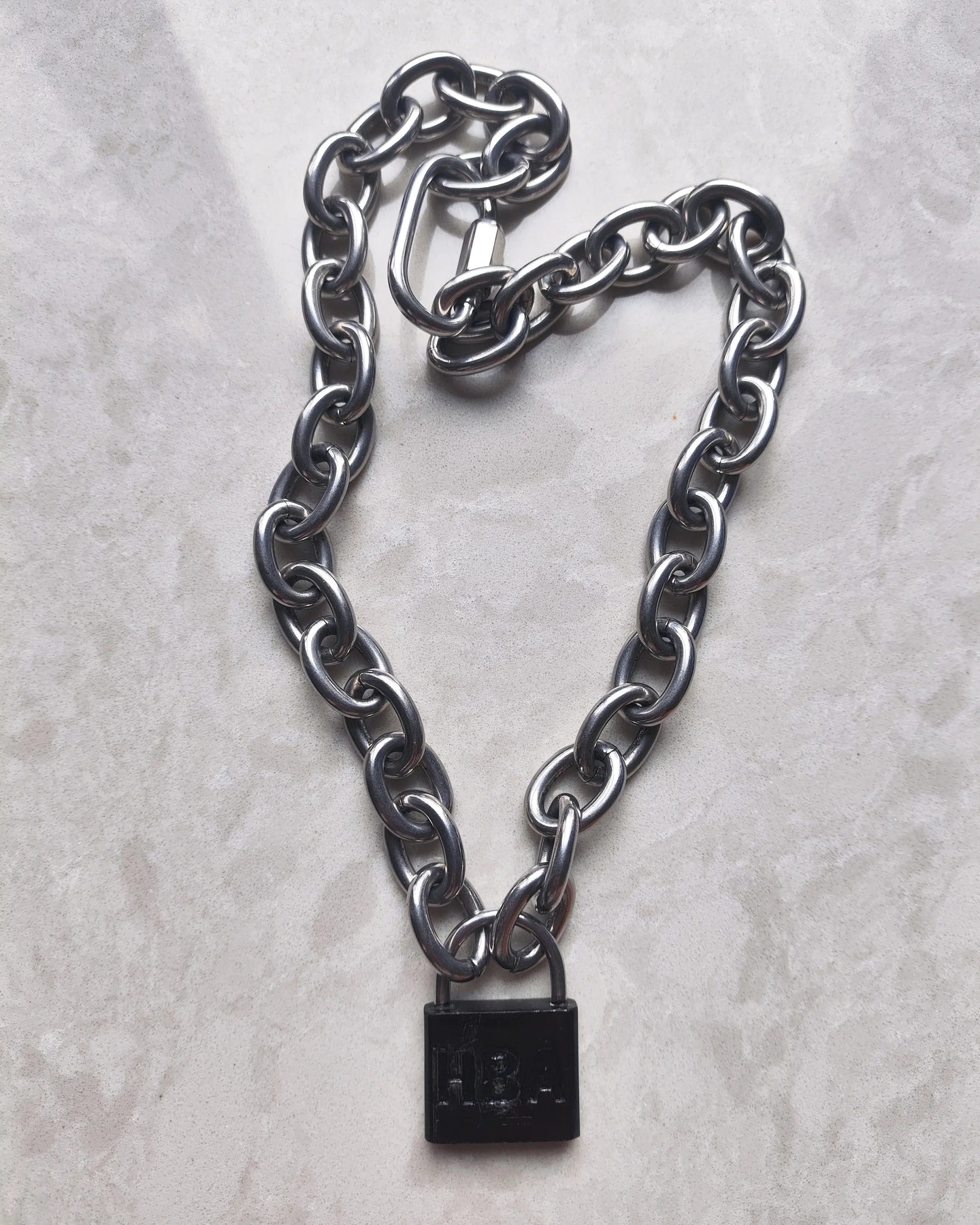 A HOOD BY AIR PADLOCK CHAIN SURFACES ON GRAILED (image 2)