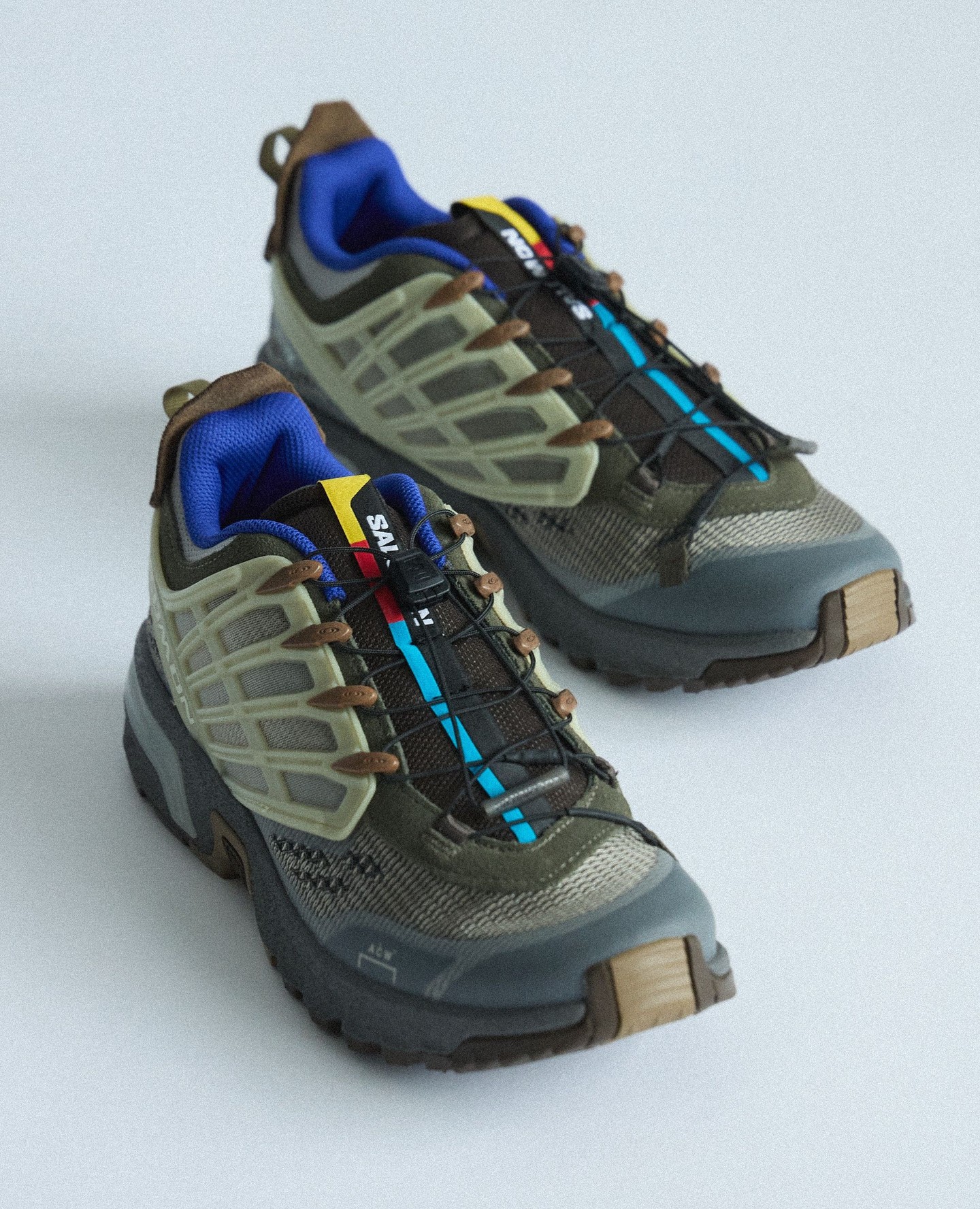 The A Cold Wall x Salomon ACS Pro sneaker, showing its floating cage midsole structure and Matryx Kevlar mesh upper.