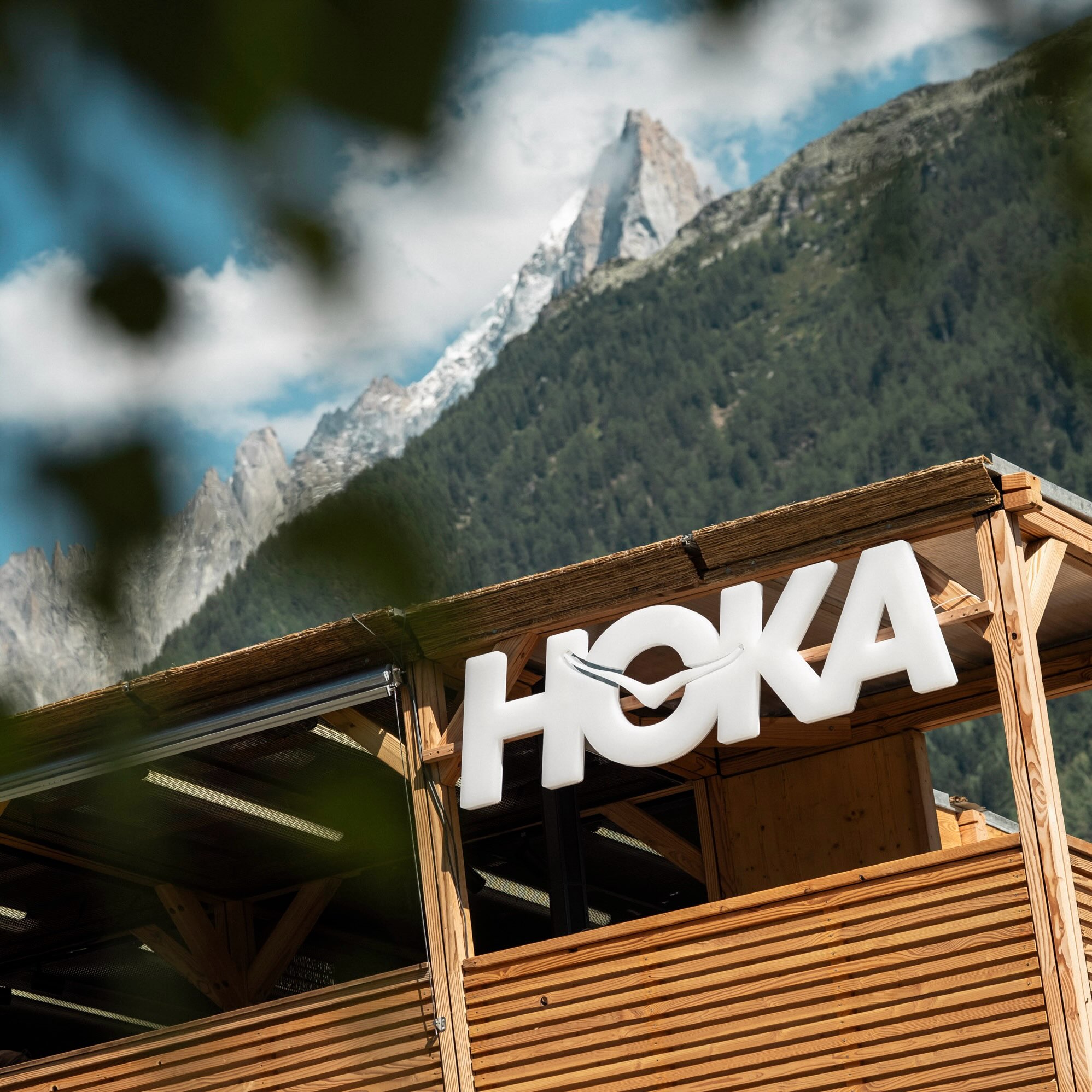 Trail runners competing at UTMB in Chamonix with Hoka as the race's new title sponsor