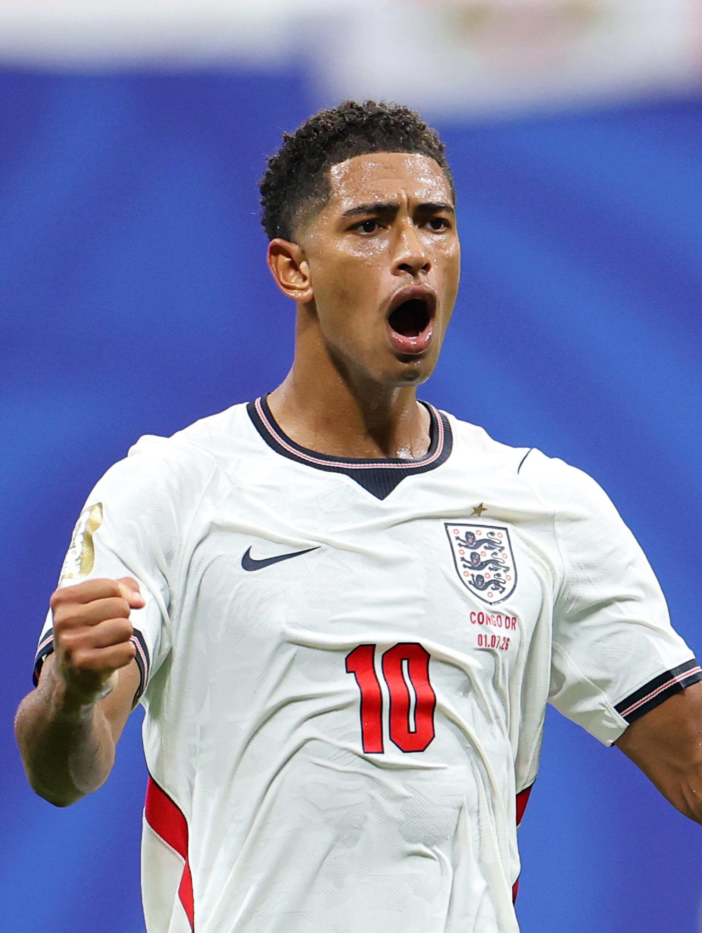Jude Bellingham in an England kit rising for a header during a World Cup 2026 match.