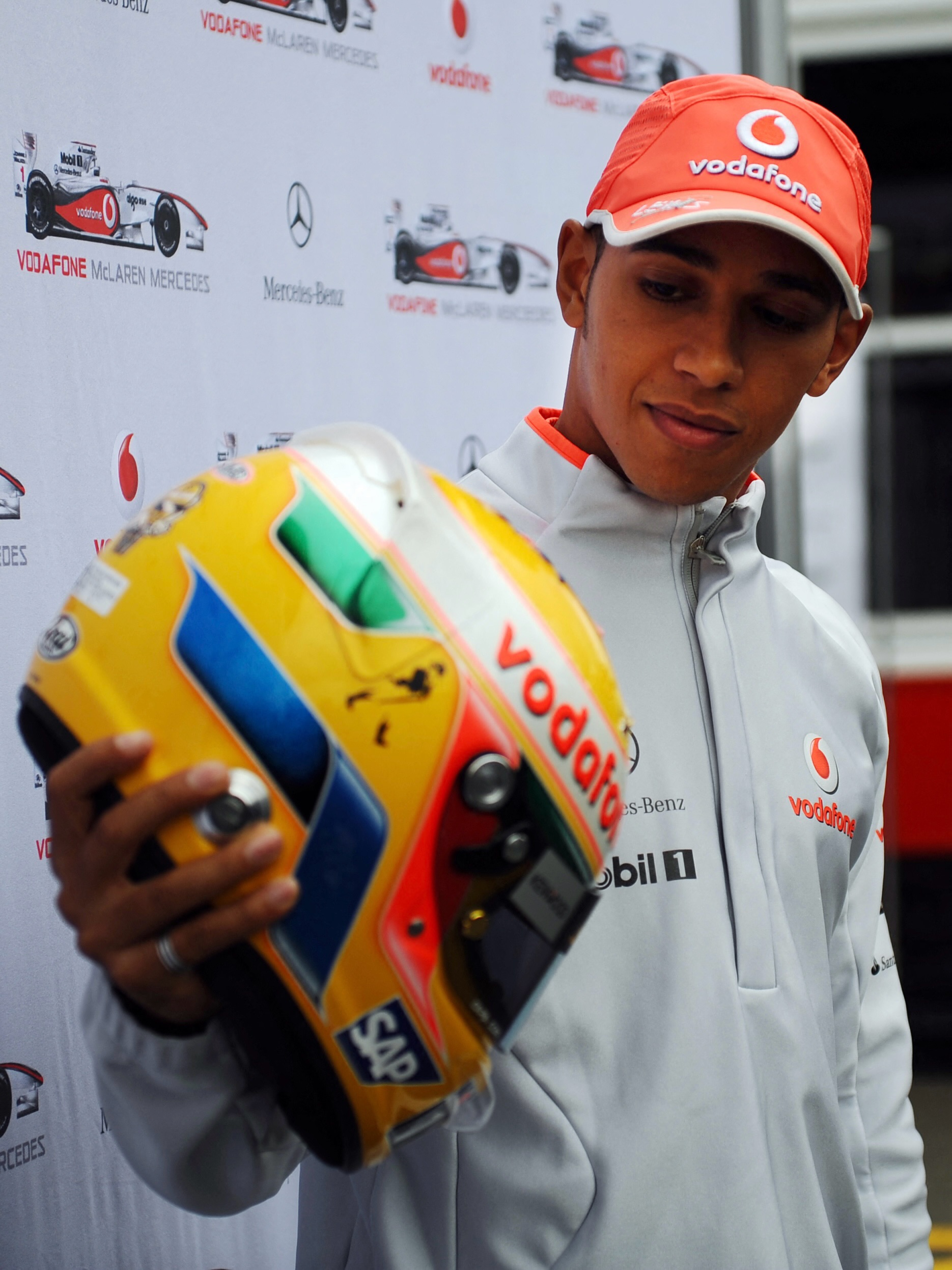 Lewis Hamilton pictured in Formula 1 team colors, from his Instagram post marking 20 years in the sport and 20 years racing at Silverstone