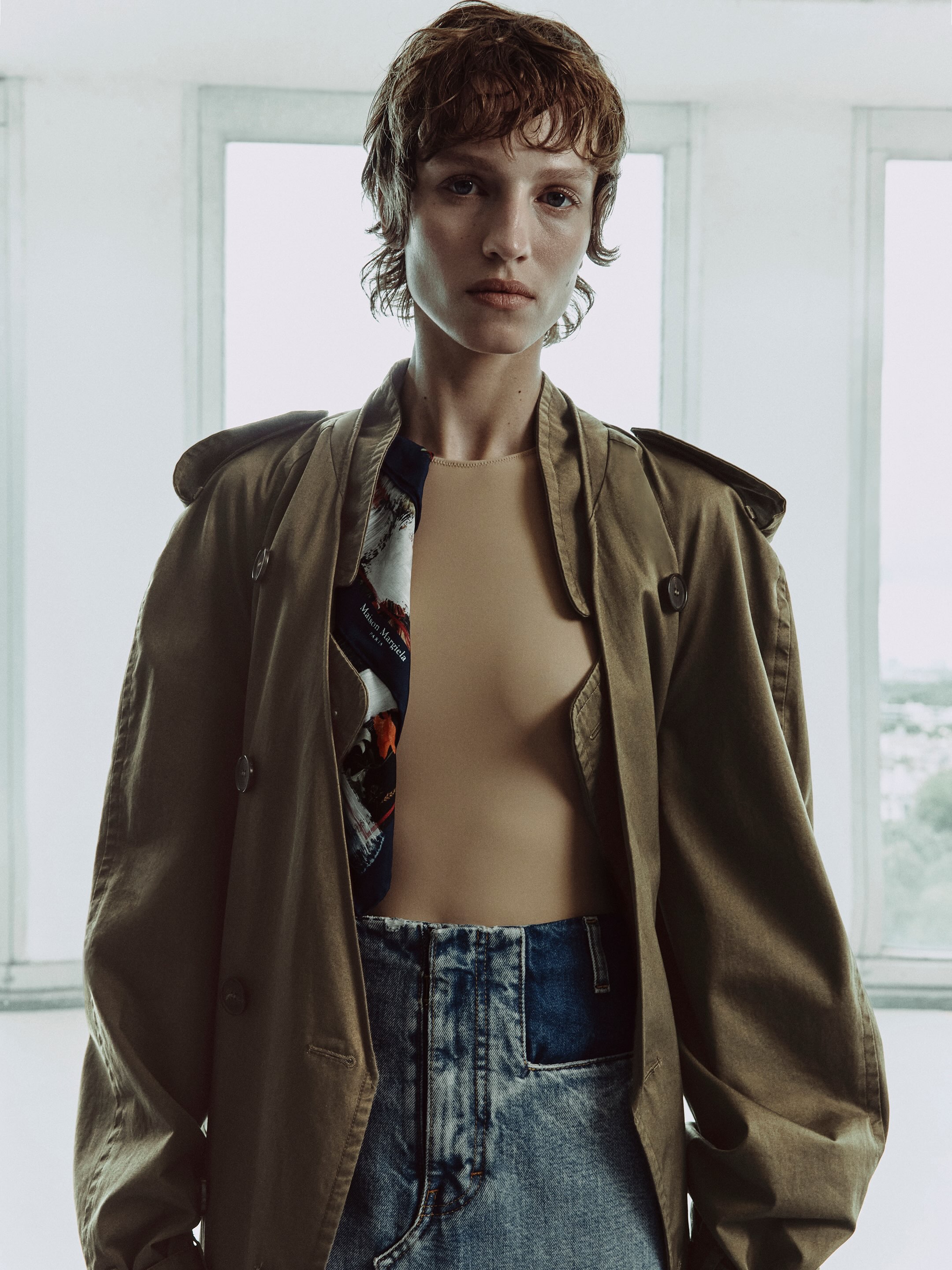 A folding collar trench and Second Skin layering from Maison Margiela's Fall Winter 2026 Avant Premiere collection