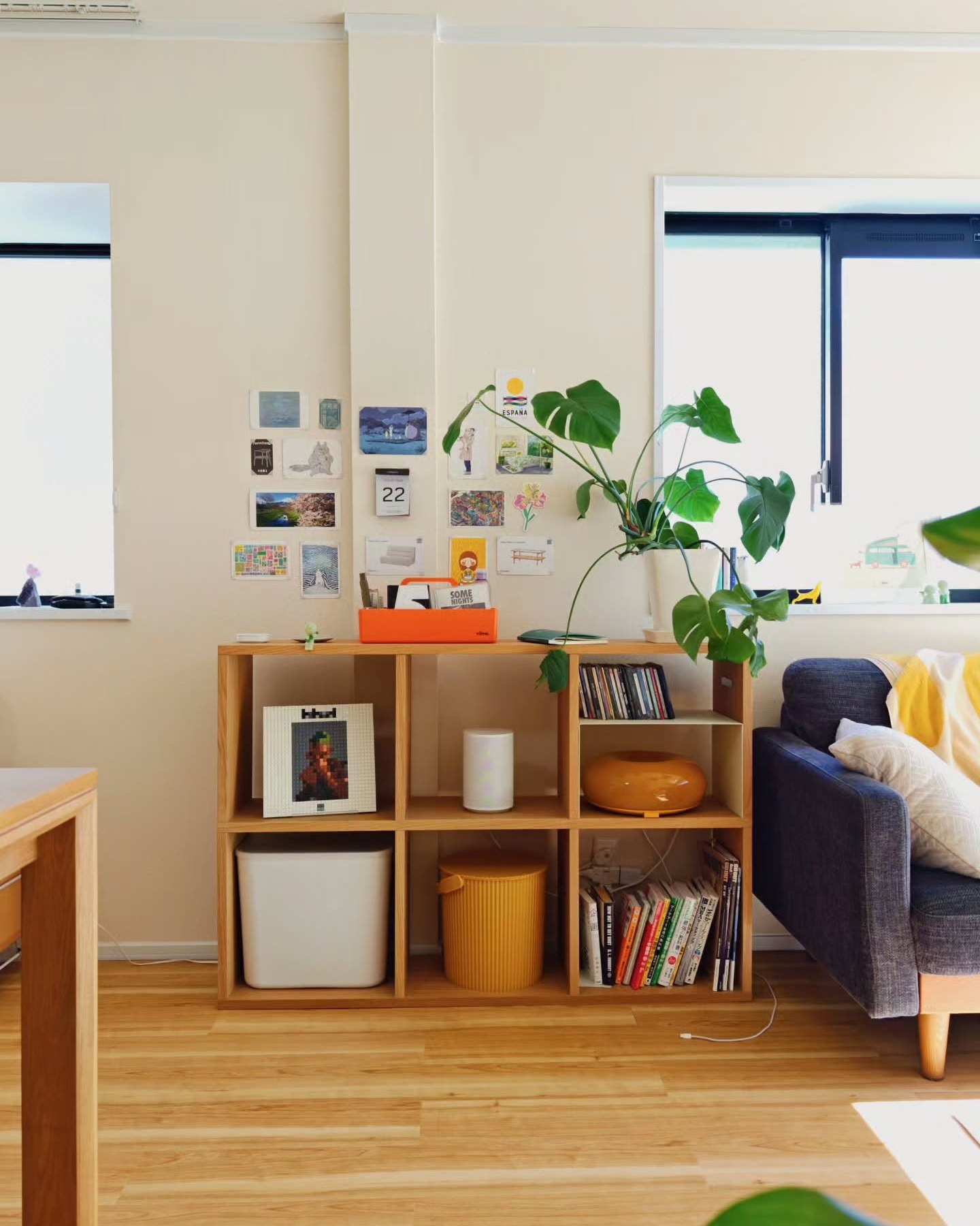 MUJI'S STACKING SHELF LIES SIDEWAYS UNDER A TELEVISION (image 2)