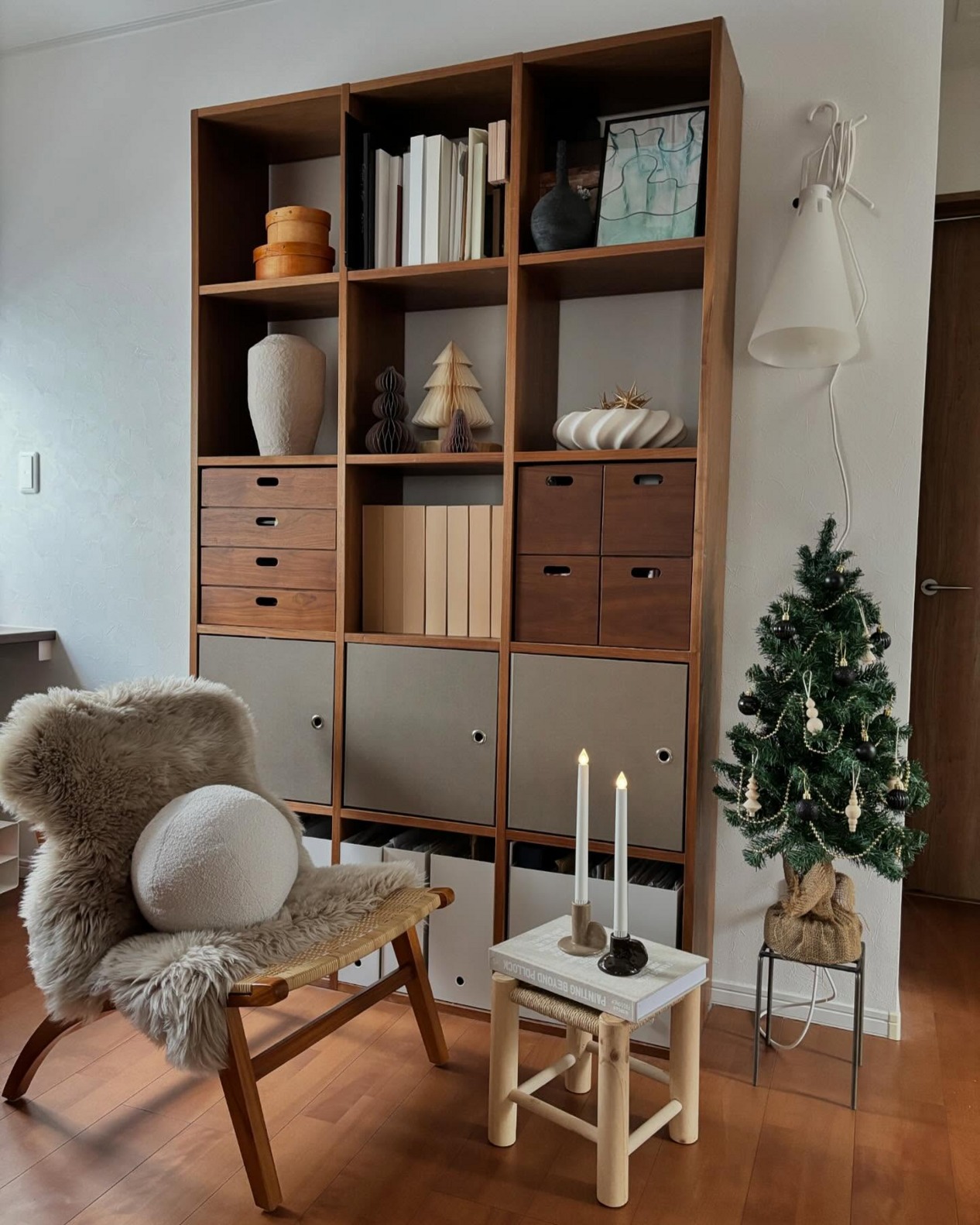 MUJI'S STACKING SHELF LIES SIDEWAYS UNDER A TELEVISION (image 3)