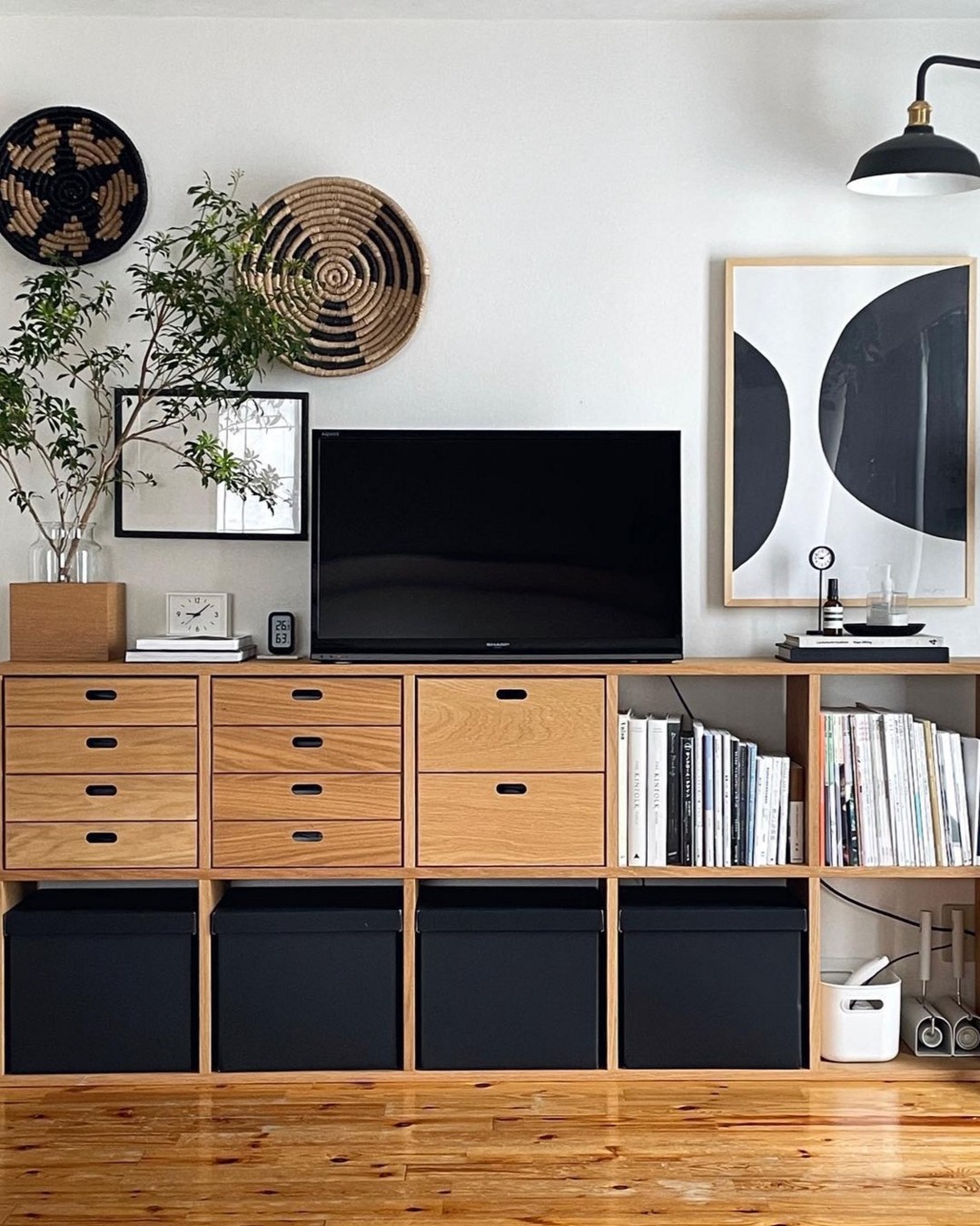 MUJI'S STACKING SHELF LIES SIDEWAYS UNDER A TELEVISION (image 4)
