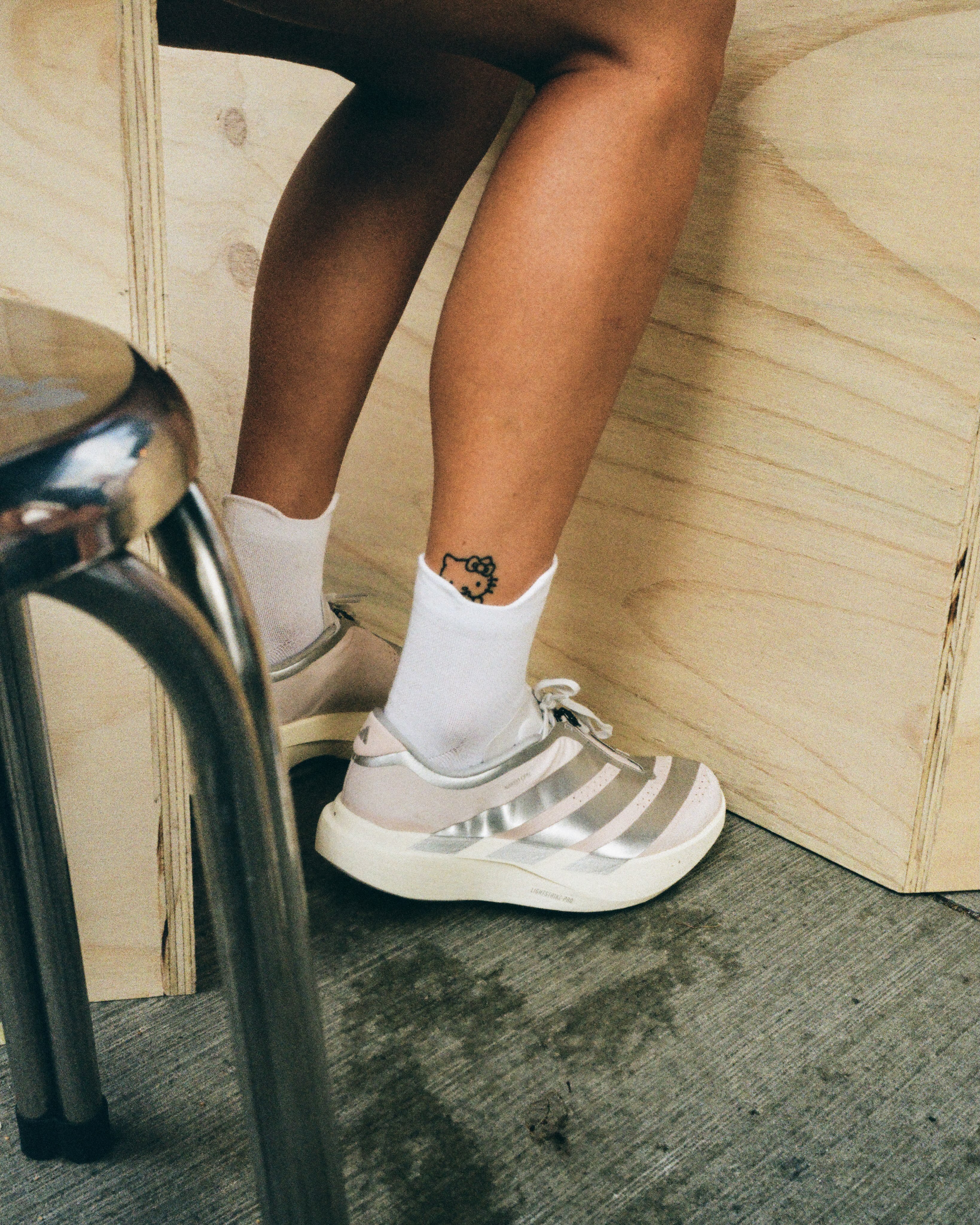 A campaign image from the adidas Running x NAKED Copenhagen capsule shoot during Copenhagen Fashion Week.
