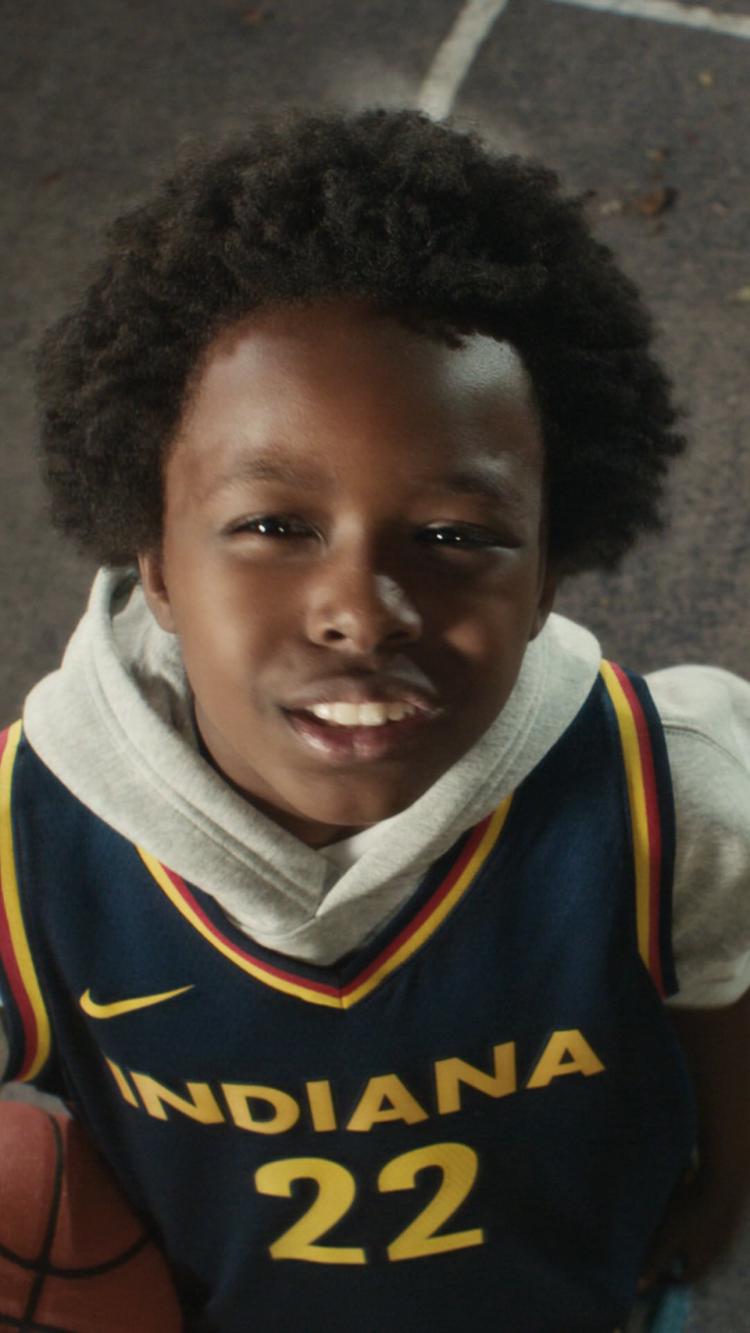 Caitlin Clark in Nike imagery for her Caitlin 1 signature shoe