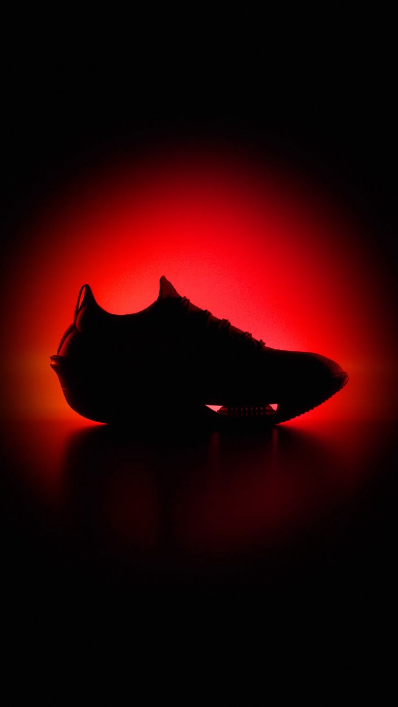 The Nike Alphafly 4 racing shoe shown in a Nike Running campaign image